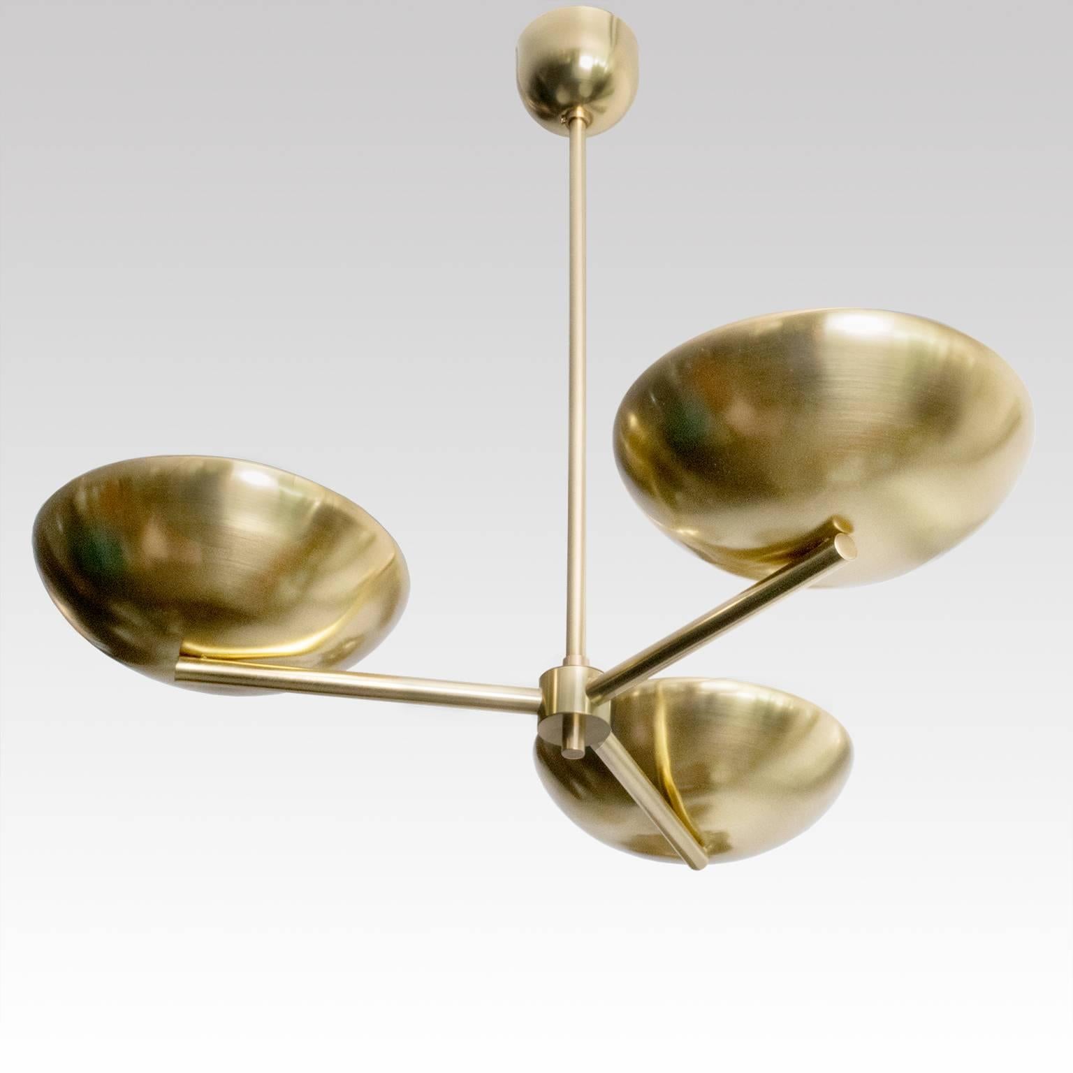 Scandinavian Modern three-arm polished brass pendant. The three bowl shaped shades delicately balance at the end of each arm. Newly polished and lacquered, rewired with three standard Edison base sockets for use in the USA.
 
Measures: Height 25