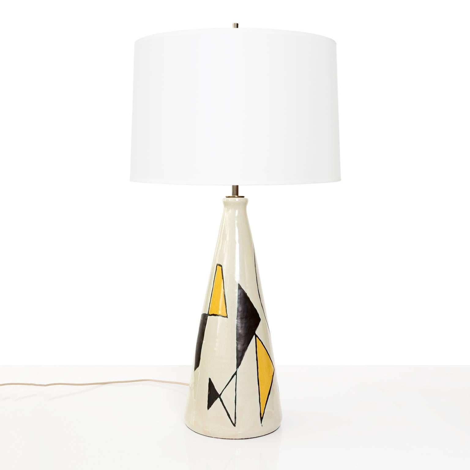 Scandinavian Mid-Century glazed stoneware table lamp by axel bruel, denmark. The lamp is decorated by bruel in abstract shapes. Newly rewired with a patinated brass double cluster of edison base sockets. Finial is adjustable.
Shade not includes
