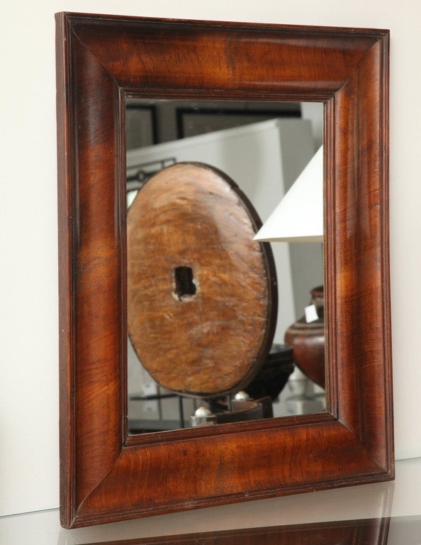 Mid-19th century walnut mirror, rectangular plate set in molded border.