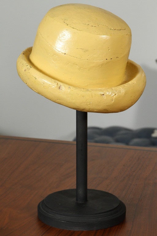 Chic yellow on black, French hat molds. Four different molds, four different heights.