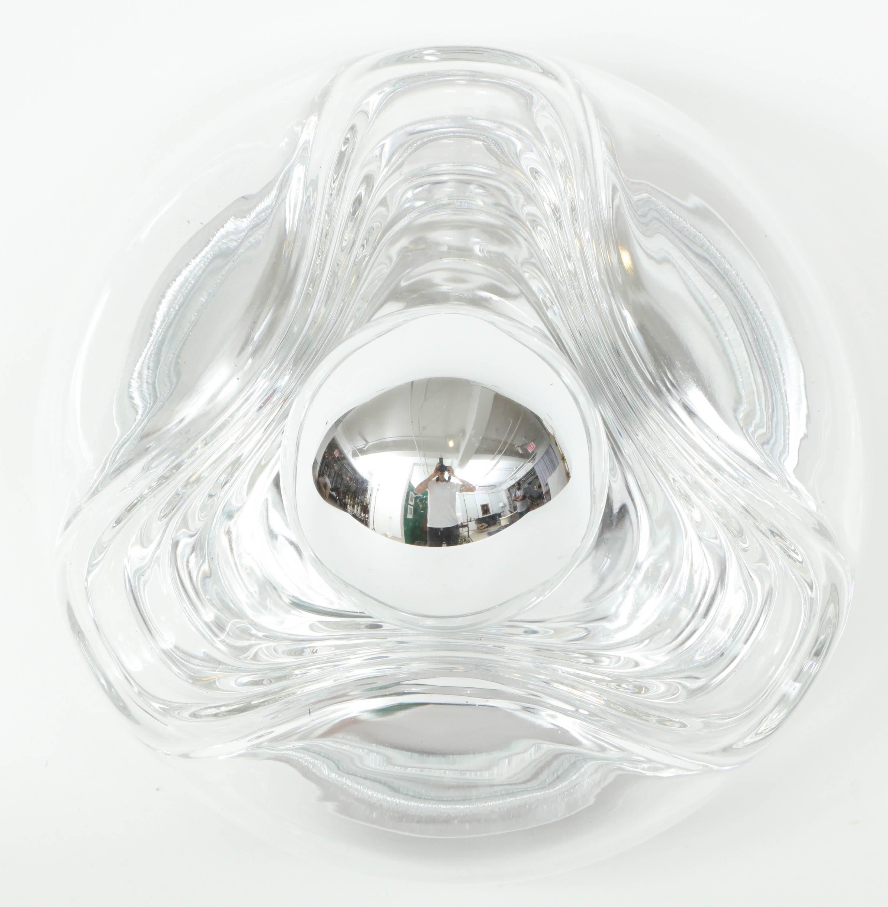 Pair of Scandinavian Modern clear glass round sconces with a wave detail. Rewired for use in the USA. Shown here with chrome tipped bulbs.

Only 1 pair is available
