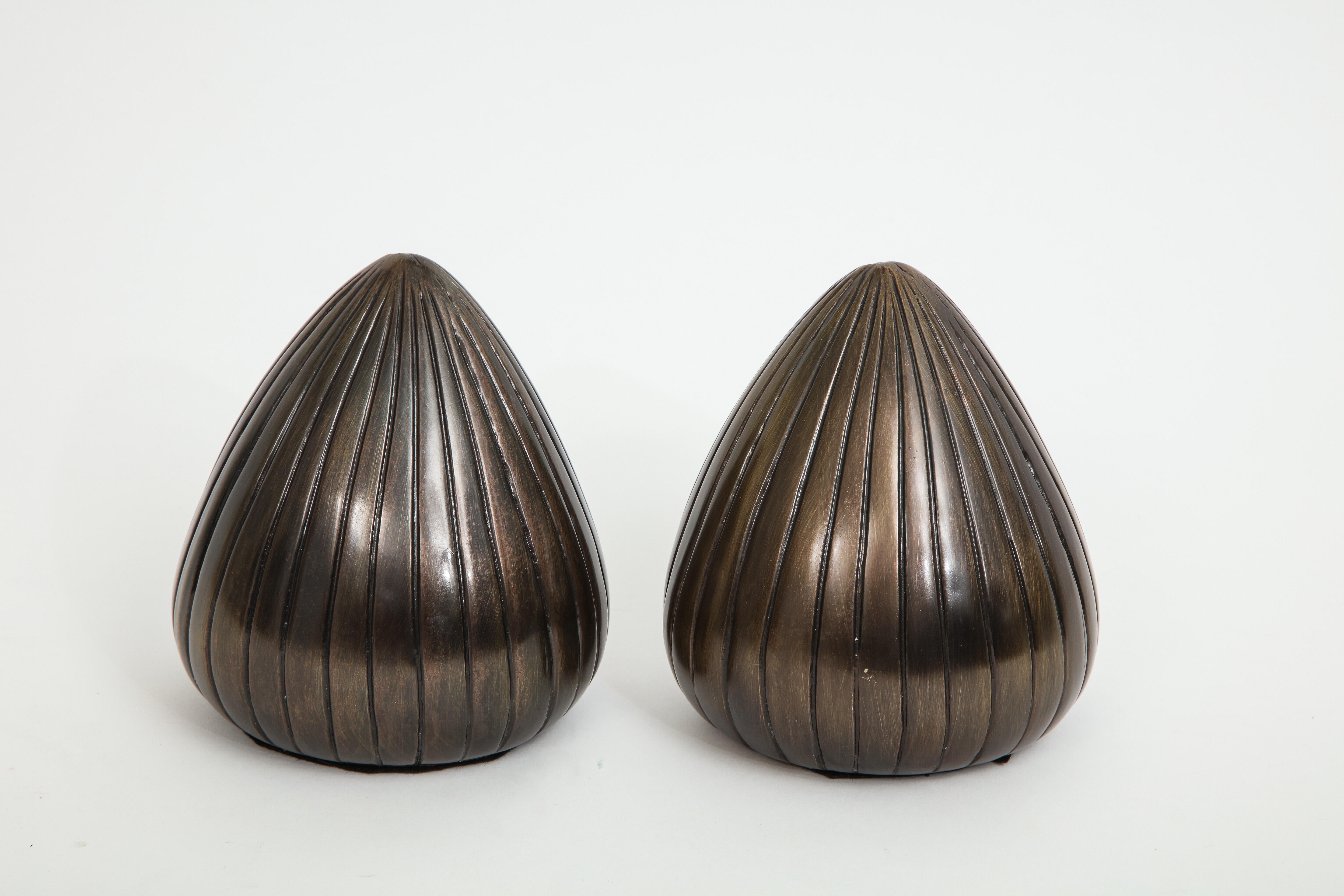 Pair of midcentury orb bookends in a gunmetal or bronze finish by Ben Seibel.