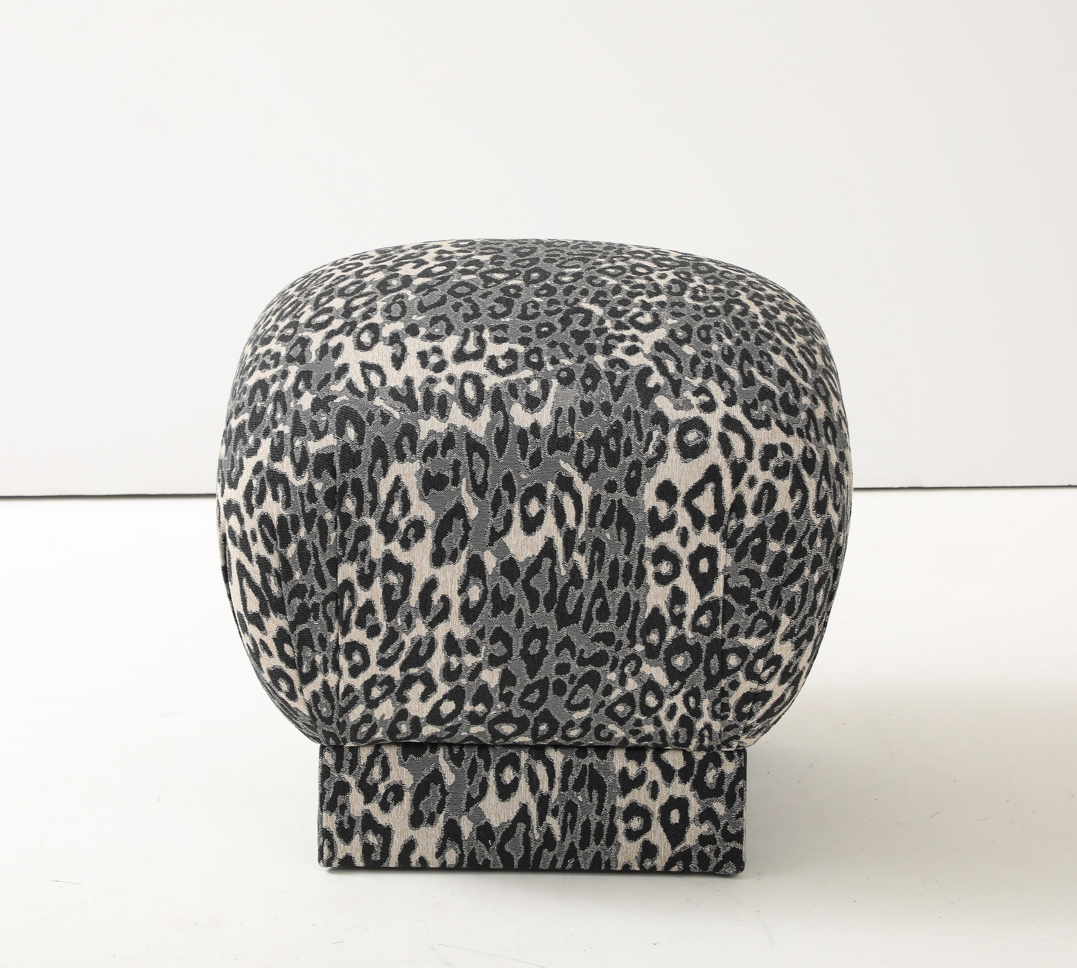 Modernist pouf/ottoman featuring a new heavy woven leopard print fabric by Bergamo. New padding and foam. Mint restored.