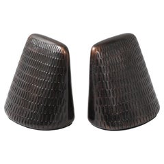 Fermalibri in bronzo cesellato di Ben Seibel