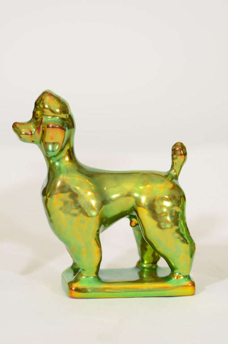 Trio of Iridescent glazed porcelain figurines by Zsolnay, Hungary. Set includes elephant, poodle, and pheasant. Marked on bottom.