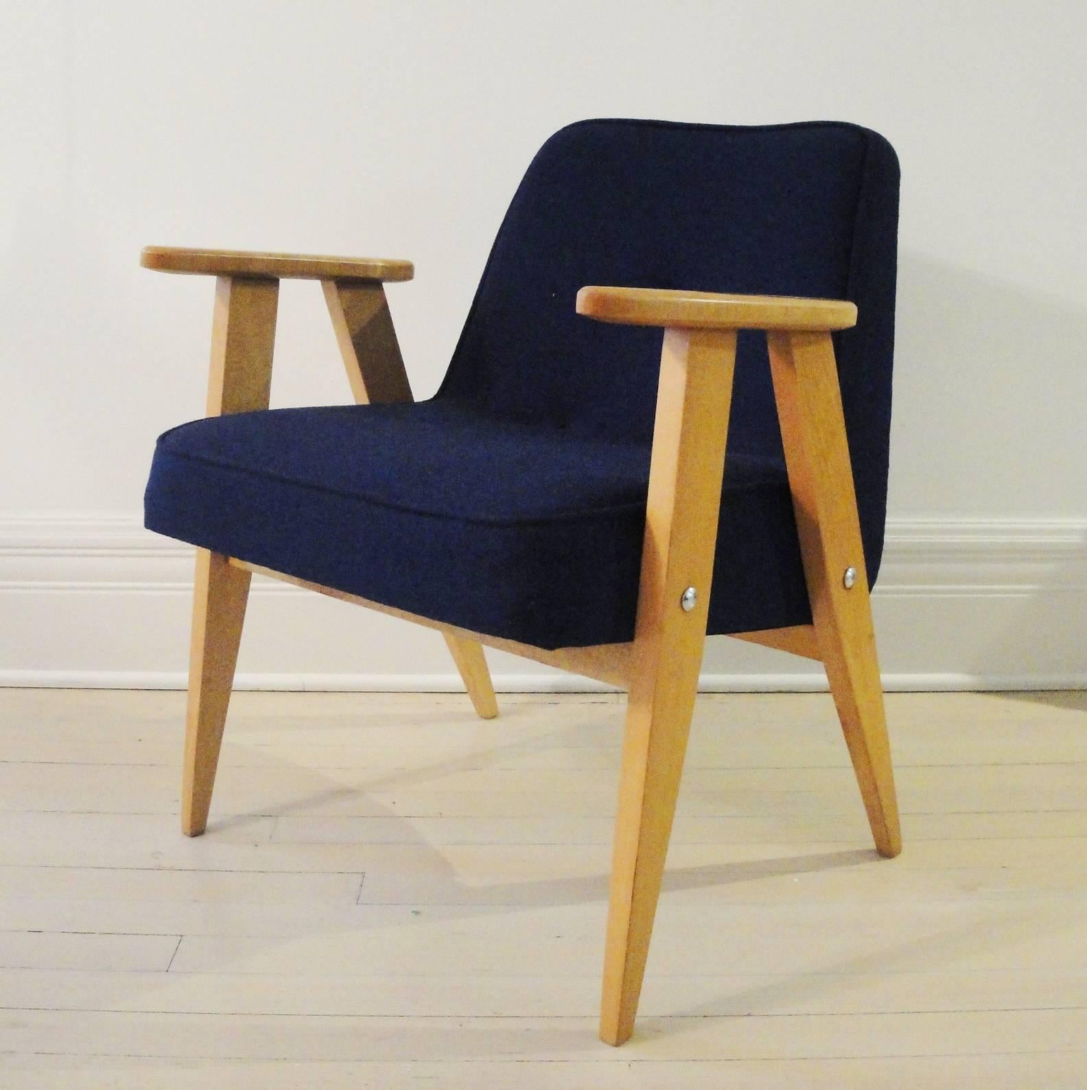 Armchair model no. 366 designed by Jozef Chierowski in 1962.
Ash wood, newly upholstered Kvadrat dark blue fabric. Simple line, very comfortable. Recently published in French "Elle Decor".