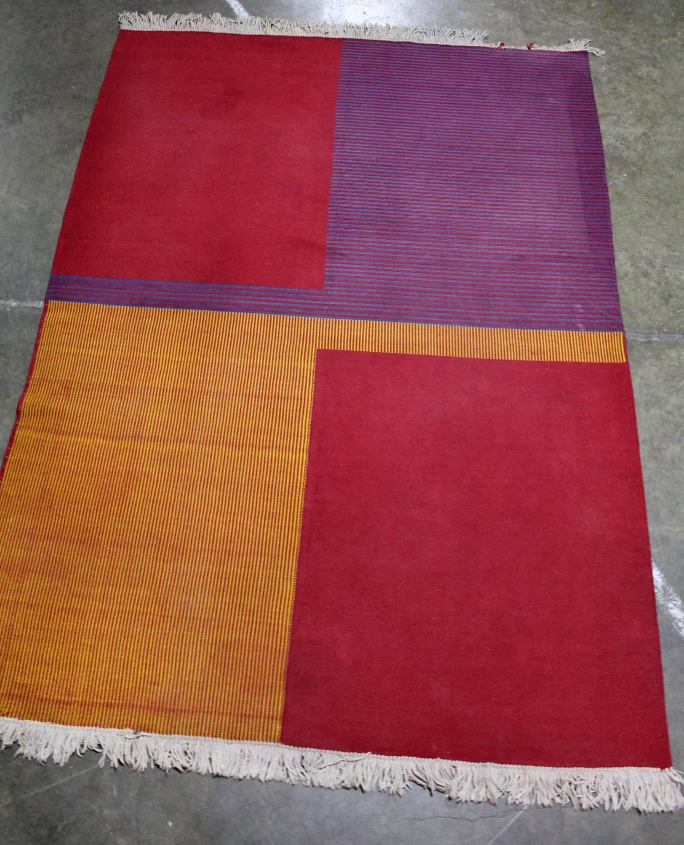 Rectangular woven wool carpet with geometrical pattern designed by Antonin Kybal.
Great example of modernist Czech design from 1920s.
Vibrant colors, few discolorations, some missing fringes.