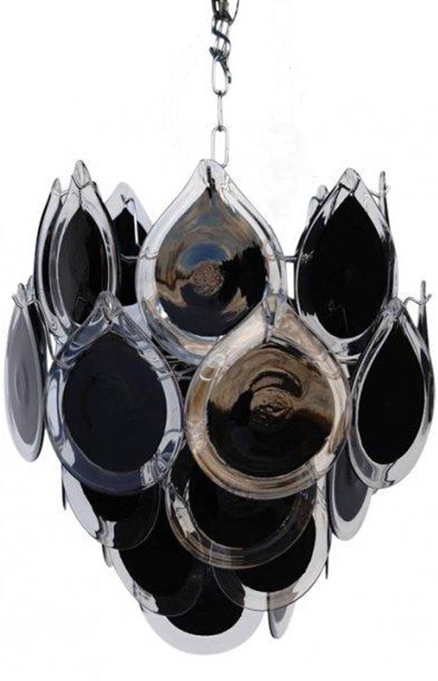 Murano glass, tear drop handcrafted glass black and clear pieces. 
Total count of glass pieces: 36, four light sockets. Adjustable height. 
New chrome-plated structure. Rewired for US market.