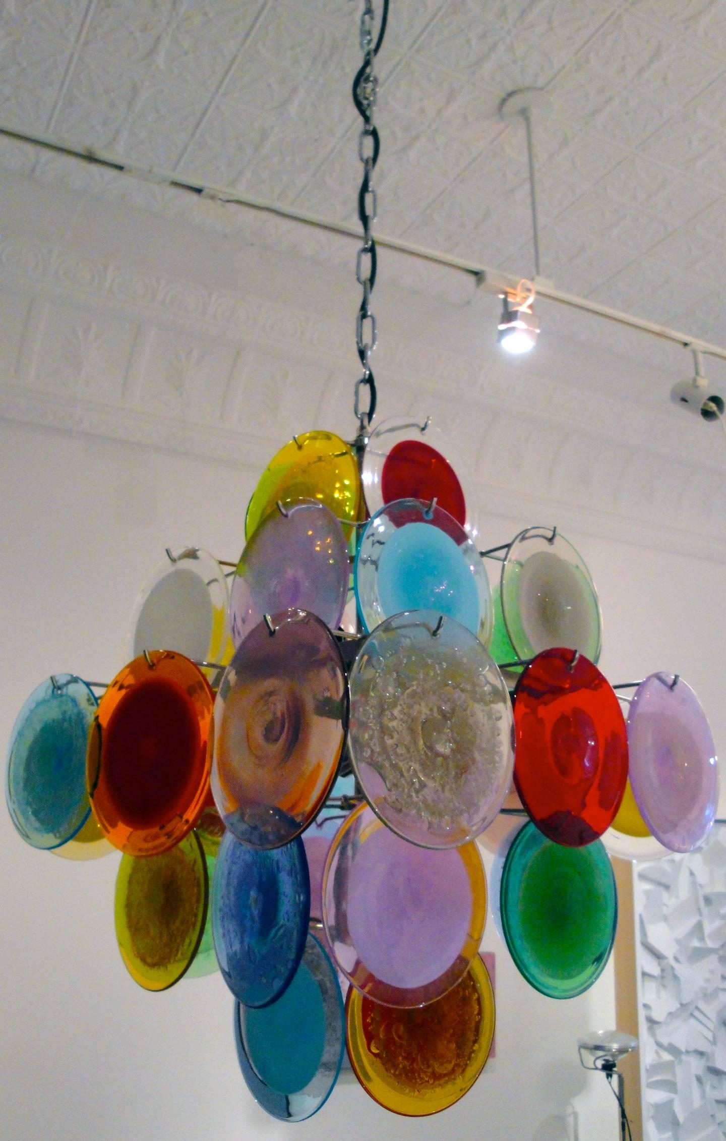Multi-color and multi technique Italian chandelier by Vistosi.
Five-tier of 36 handcrafted round disks. New chromed metal structure,
rewired for American market.