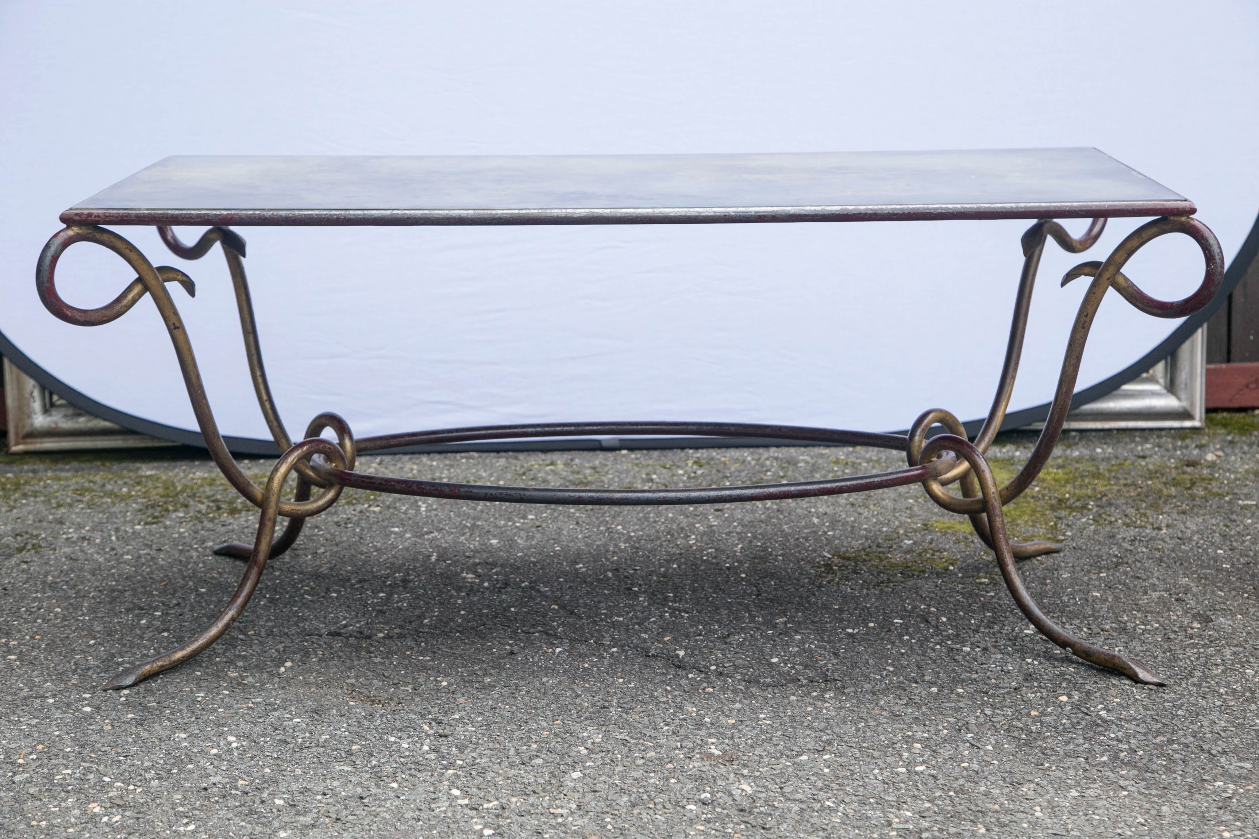 Forged iron coffee table with glass top