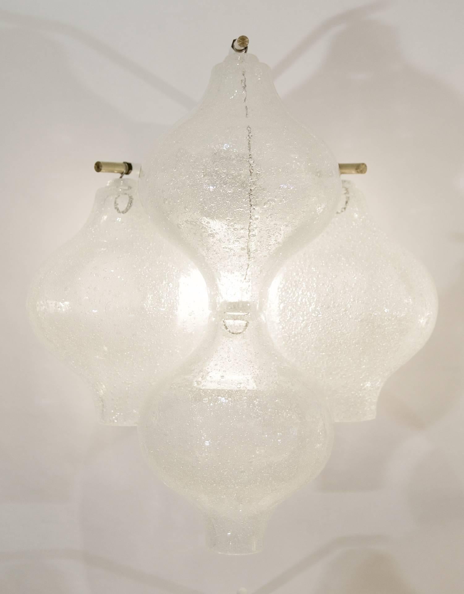 Exquisite Kalmar sconces, each with four pieces of Tulipan glass suspended from brass mounting pins on the white enameled backplate.

Each sconce takes an E-14 base bulbs up to 40 watts per bulb. New wiring.

Please note the price listed is per