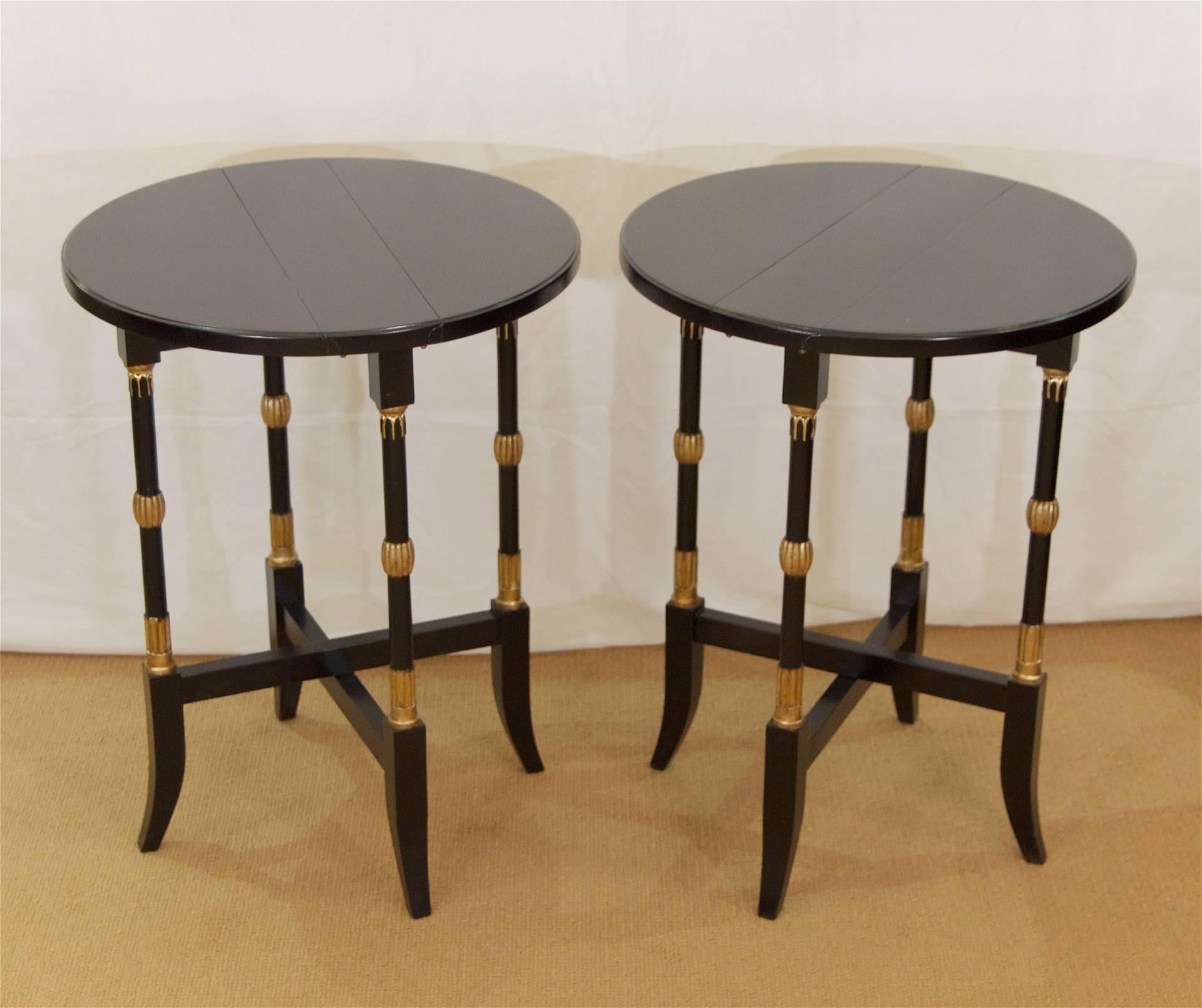 Excellently sized vintage folding occasional tables in a Regency style, original to the Fontainebleau hotel. Newly refinished in satin black lacquer with original gilt detailing to legs.

Priced per piece.

Four available refinished; two others