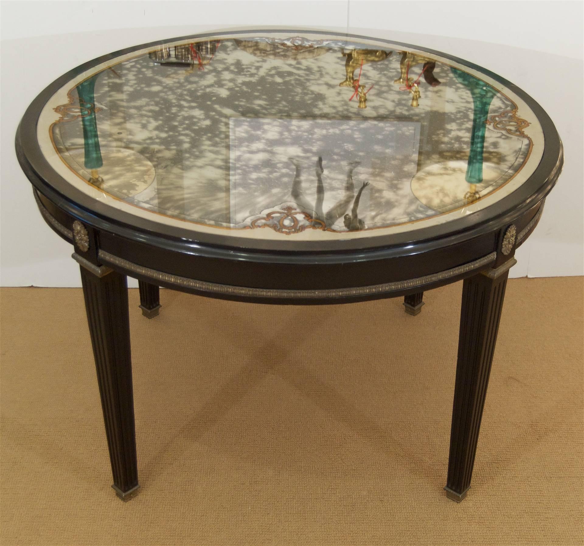 French Jansen (Stamped) Black Lacquer Center/Dining Table with Eglomisé Glass Top For Sale