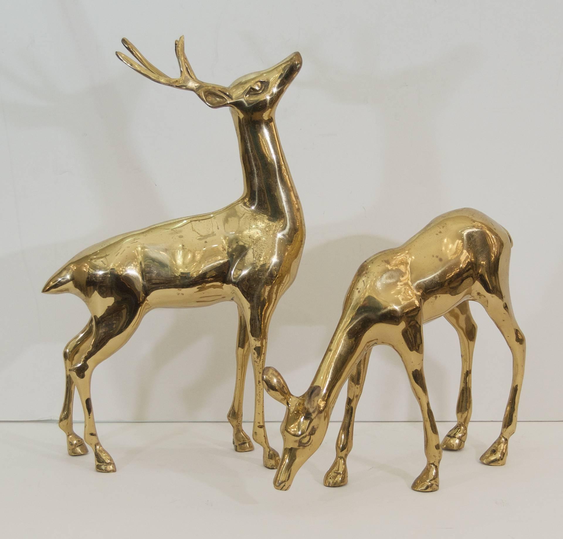Generously sized pair of elegant reindeer in brass.

Dimensions listed are of larger, male deer.