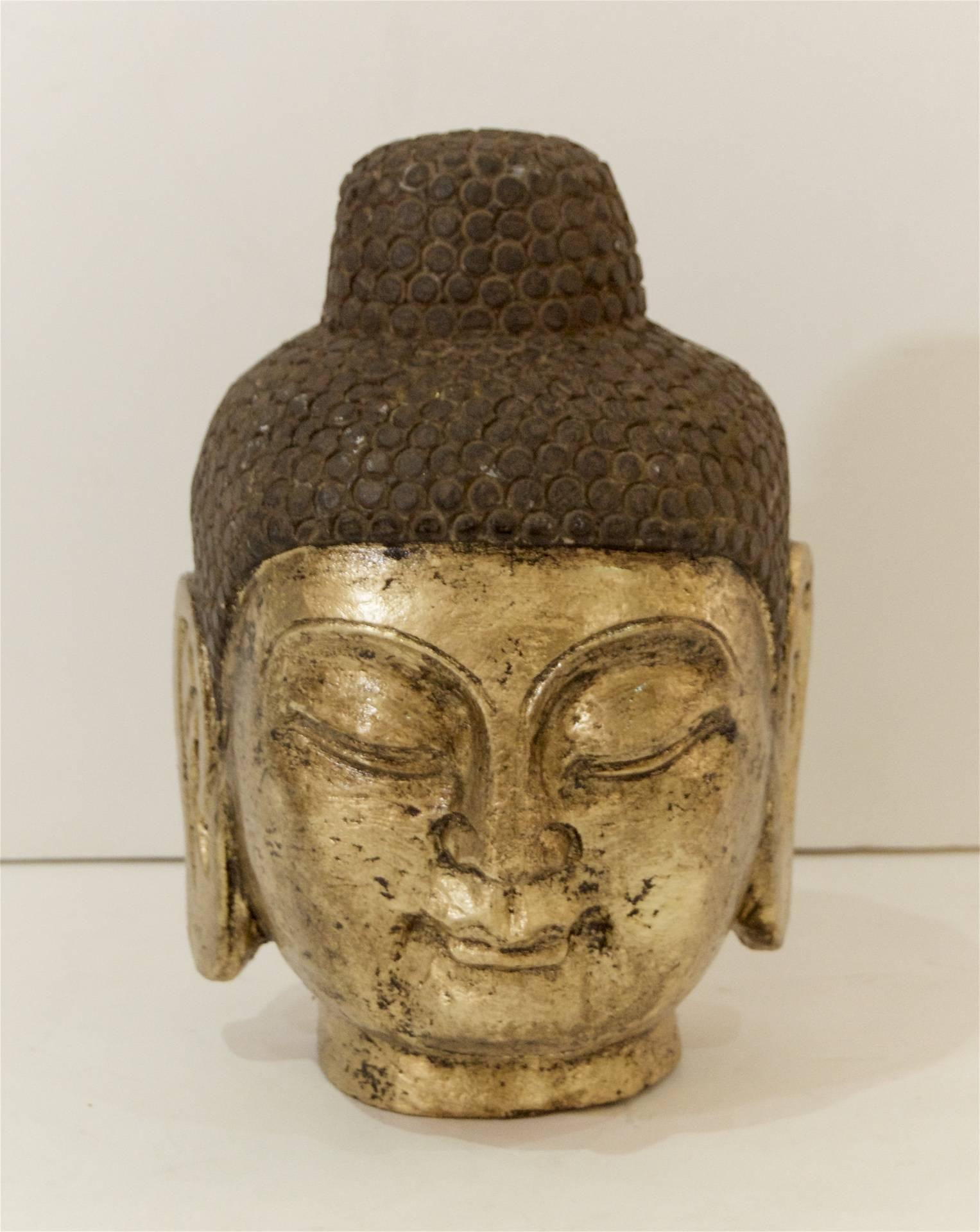 Excellent Buddha head of carved stone with gilt face. 

Uncertain age of creation, no later than early 20th century.