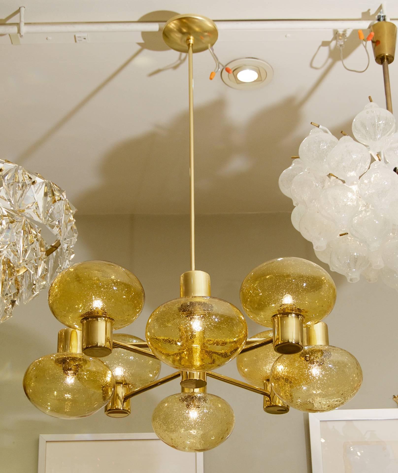 German Eight-Arm Doria Brass Chandelier with Amber Glass Globes