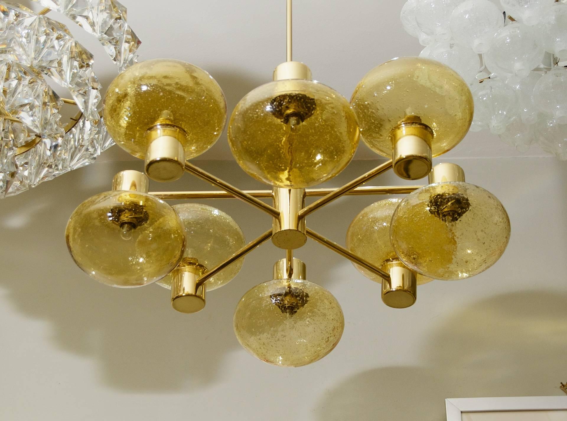 Mid-20th Century Eight-Arm Doria Brass Chandelier with Amber Glass Globes