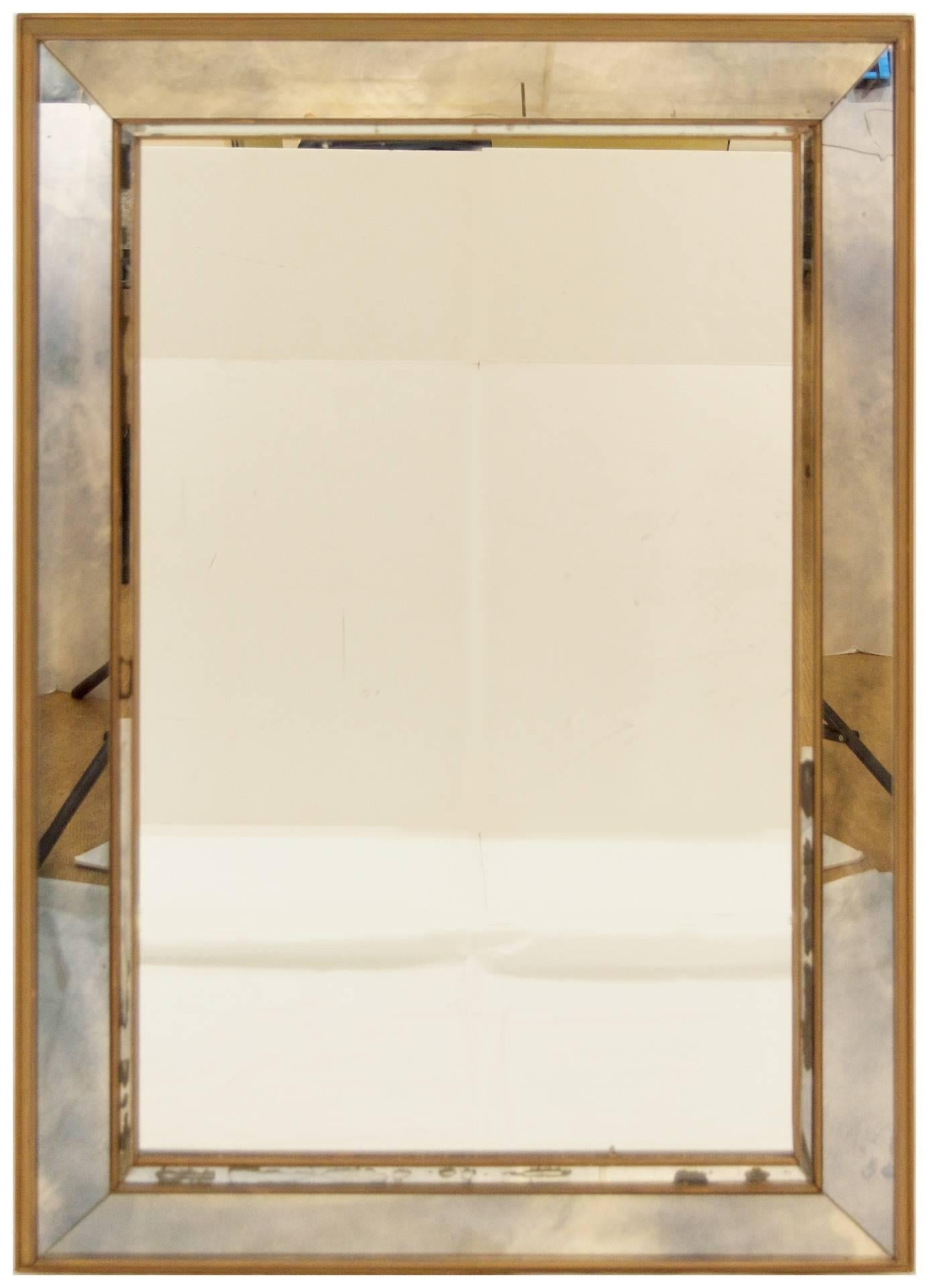 Mid-Century Modern Pair of Giltwood and Antiqued Paneled Mirrors