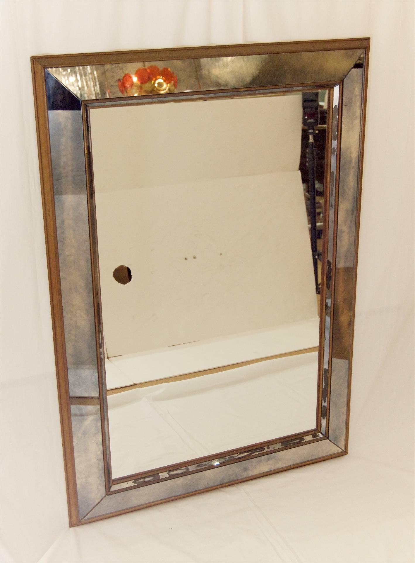 Pair of Giltwood and Antiqued Paneled Mirrors In Excellent Condition In Stamford, CT