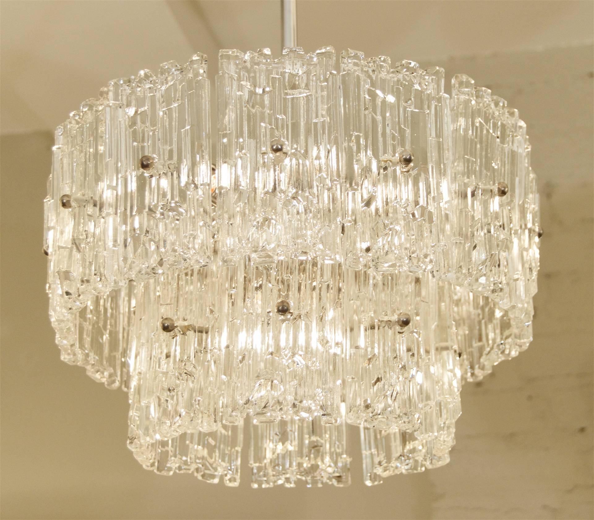 Two-tiered chandelier by Hillebrand with rectangular faceted glass.

Takes six E14 based bulbs up to 40 watts per bulb and one medium base downlight up to 60 watts. New wiring.

Height listed is of chandelier body only, current height as hung is