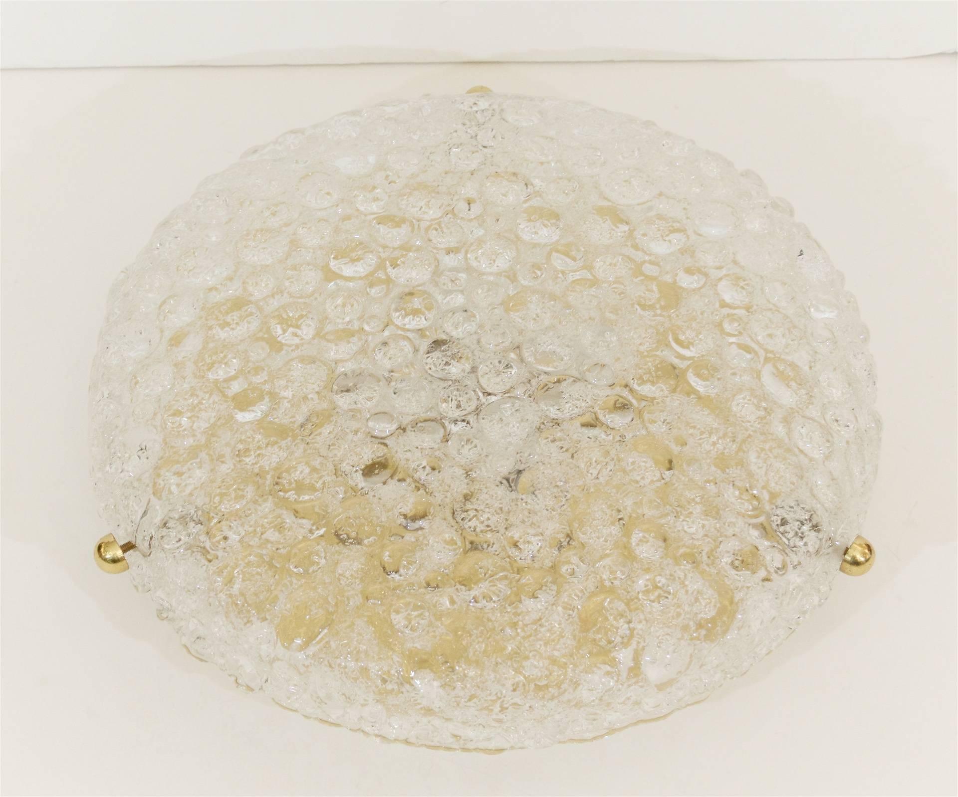 A highly textural bubble surface to the outside of the glass and granulate fused interior create exceptional radiance fastened with brass mounting pins.

Takes 4 E-14 base bulbs up to 40 watts per bulb, new wiring.

