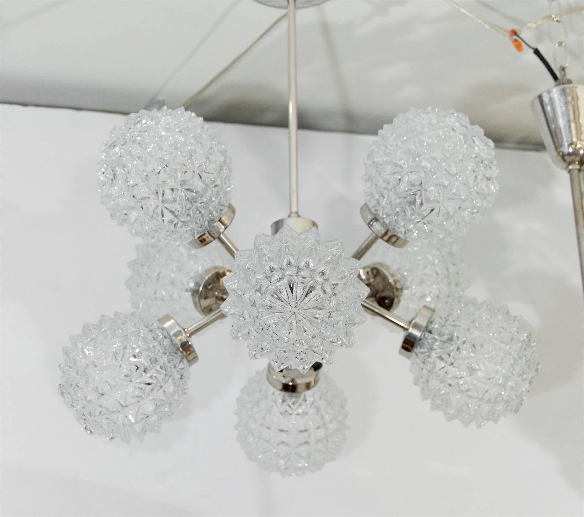 Fantastic sculptural sputnik chandelier by Richard Essig, with eight cut crystalline pattern globes. 

Completely rewired, each arm takes a single E-14 base bulb up to 40 watts per bulb. 

Height listed is of chandelier body only. Current drop