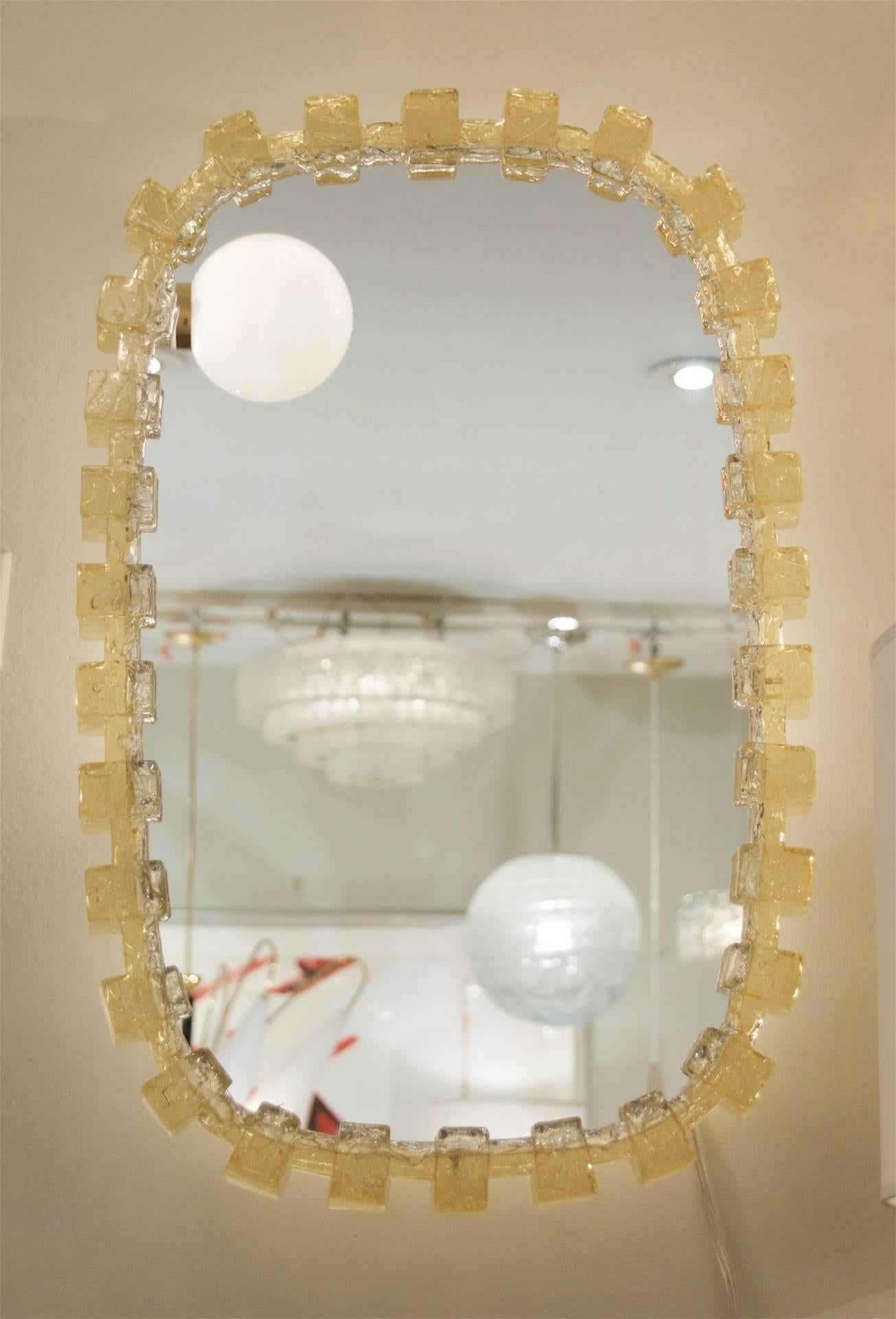 Beautiful Lucite framed mirror with interior lights. Perfect sizing for a vanity or powder room. 

Takes six E-14 base bulbs up to 40 watts per bulb, new wiring.