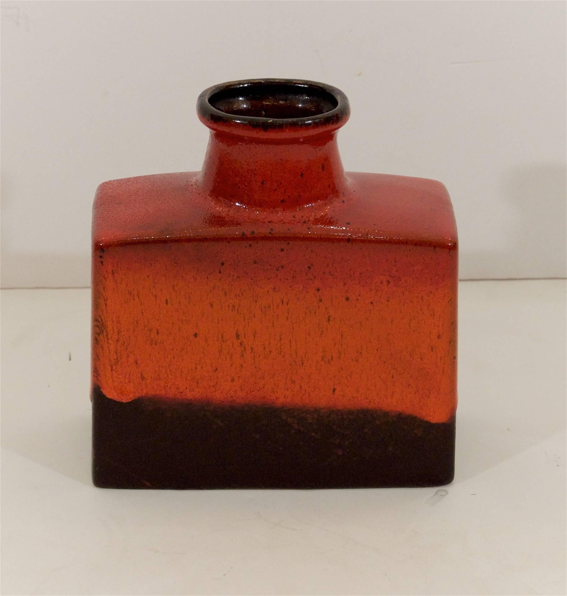 Well-formed Scheurich Keramik vase, the glaze in varigated gloss tones of red ochres dissolving to a matte earth tone base glaze.