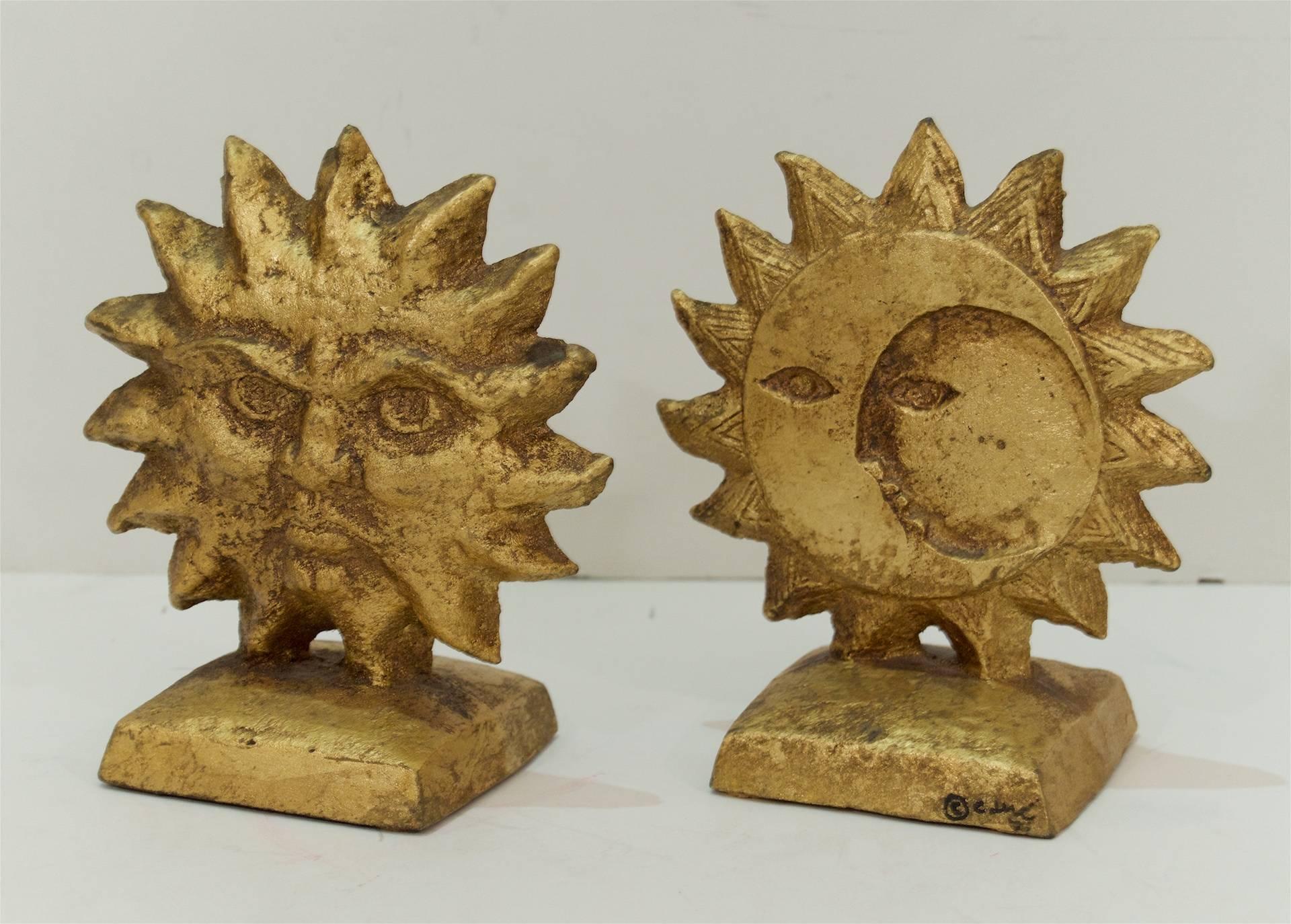 Pair of signed Curtis Jere gilt steel bookends. The front side a sun and the reverse a carved moon; stylistically reminiscent of the illustrations of William Blake.

 