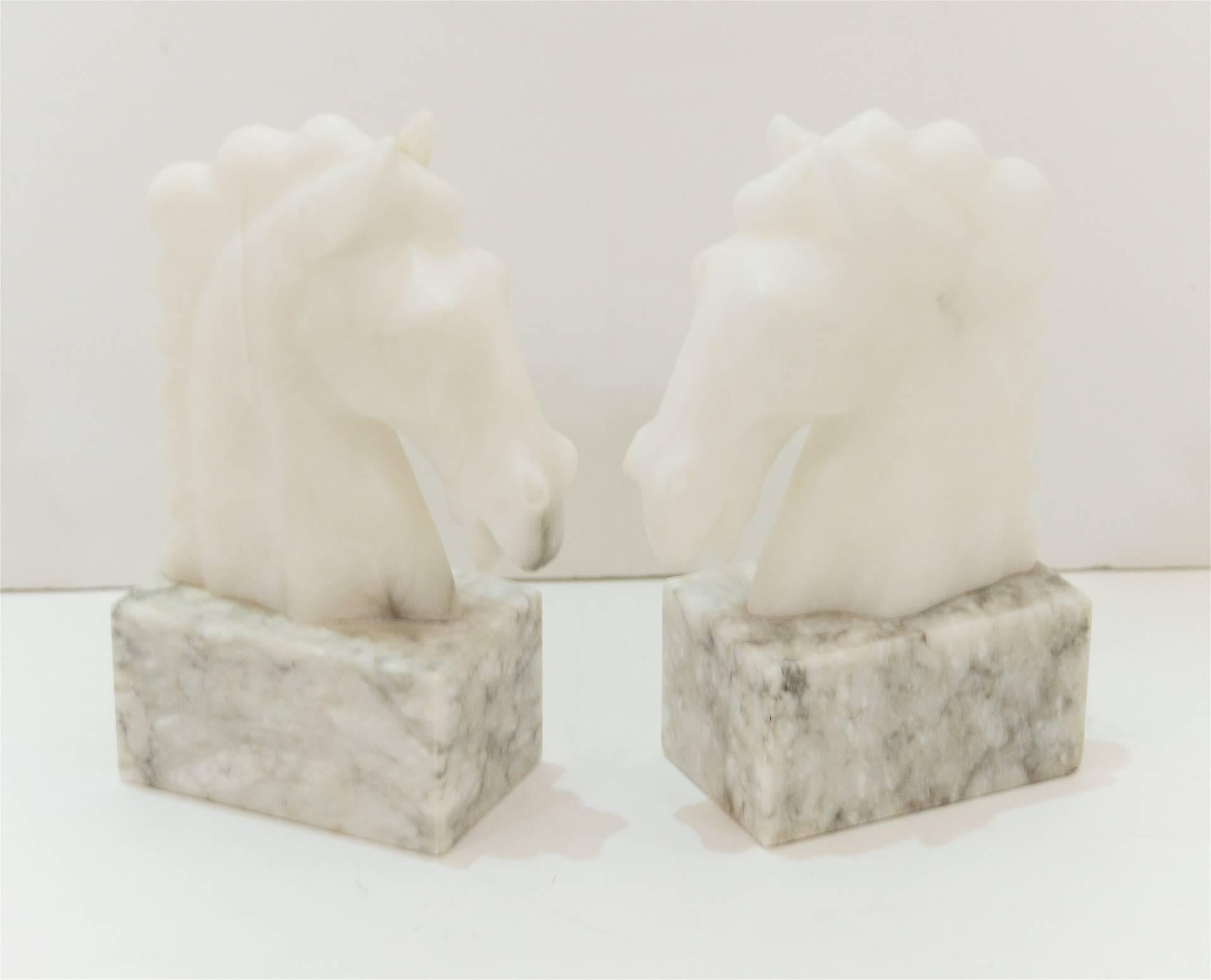 Pair of carved marble horse head bookends.