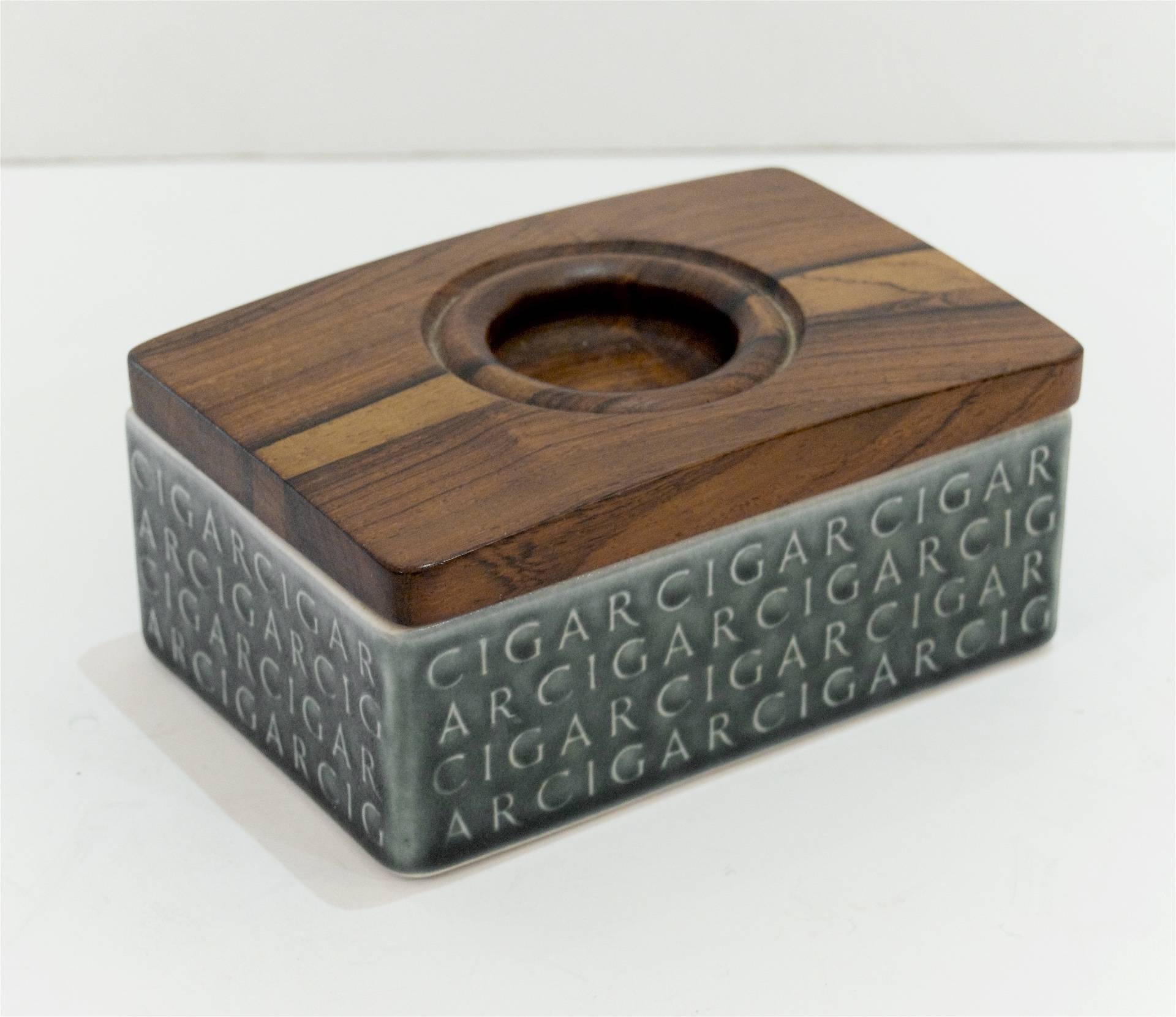 Danish glazed ceramic cigar box by Jens Quistgaard for Kronjyden with carved rosewood top. Signed on underside.