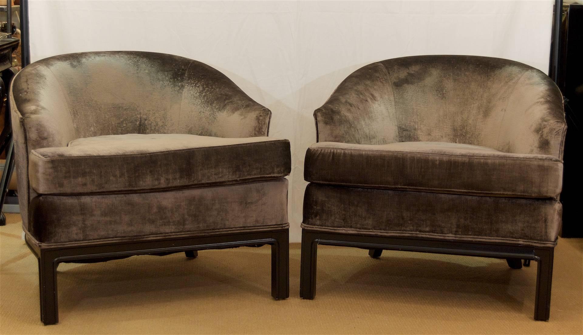 Elegantly shaped pair of American midcentury club chairs, newly reupholstered in a moleskin-tone brown-grey velvet, the bases newly lacquered in satin black. Extremely comfortable.