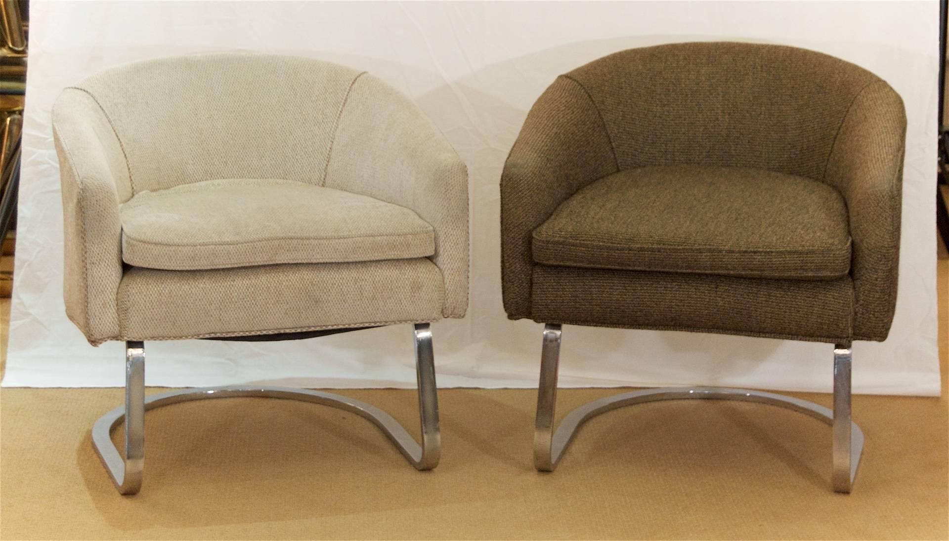 Pair of Milo Baughman style club or lounge chairs, the bodies with a cantilevered chrome arc base.

See notes regarding condition.