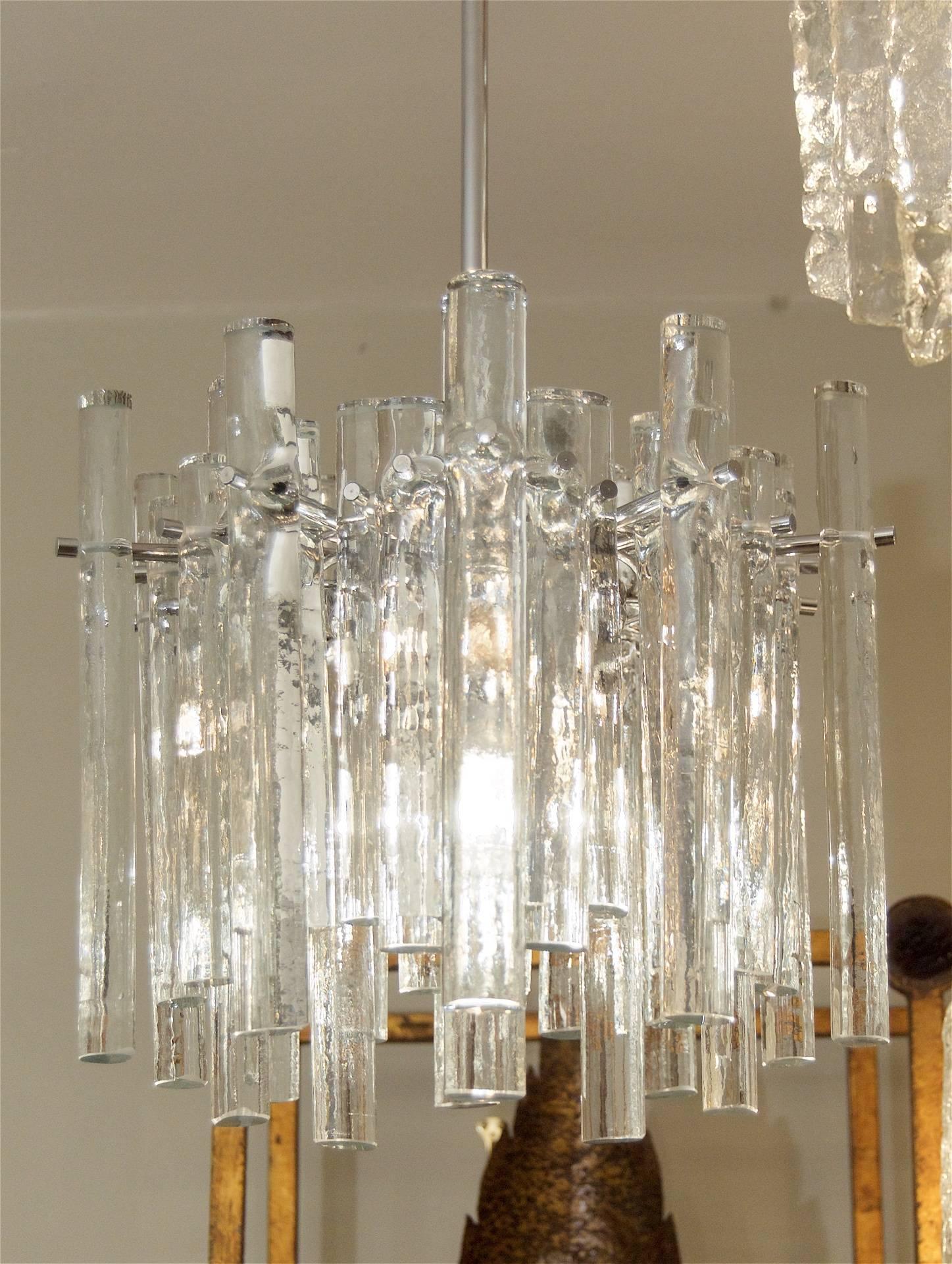 This elegant ice crystal fixture by Kinkeldey will complement all decors. 

Three E-14 base bulbs radiate from body, up to 40 watts per bulb, and one medium base downlight bulb, up to 60 watts. New wiring. 

Height is of light fixture only.