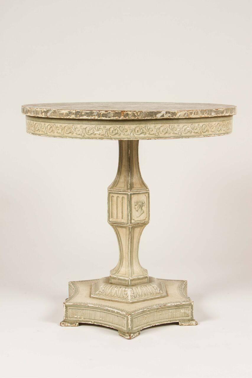 Wonderfully painted trompe l’oeil table from the 19th century. Faux marble-top with a hexagonal base formed with curved sideband raised on shaped feet. This table is the perfect backdrop for a lamp and collection of books in a bedroom or sitting