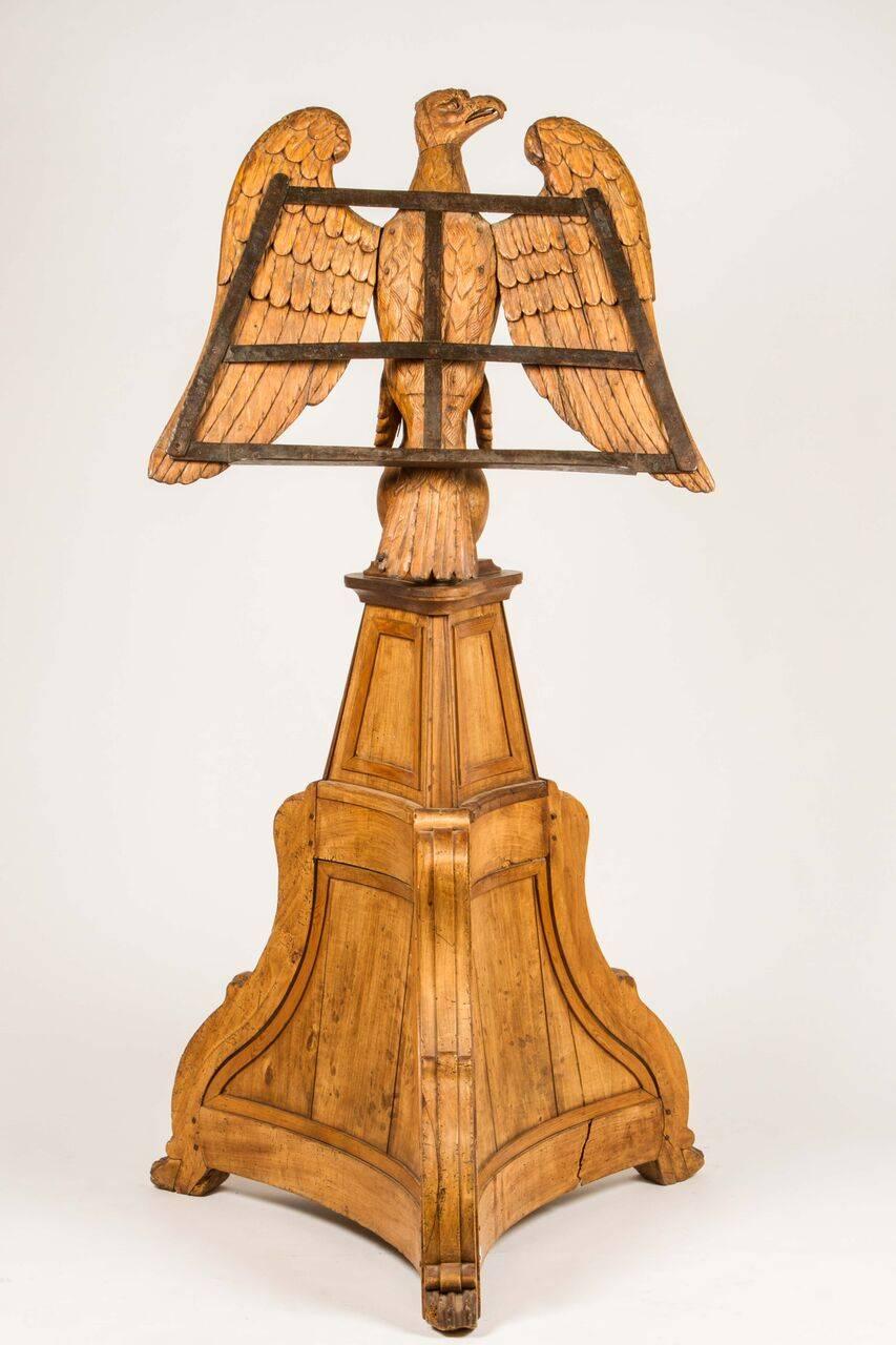 This beautiful Northern European lecture in fruitwood has the music rack mounted to the back of an eagle with wings spread, on a shaped pedestal. It would be great as a beautiful sculpture in a room, especially in a very contemporary white loft