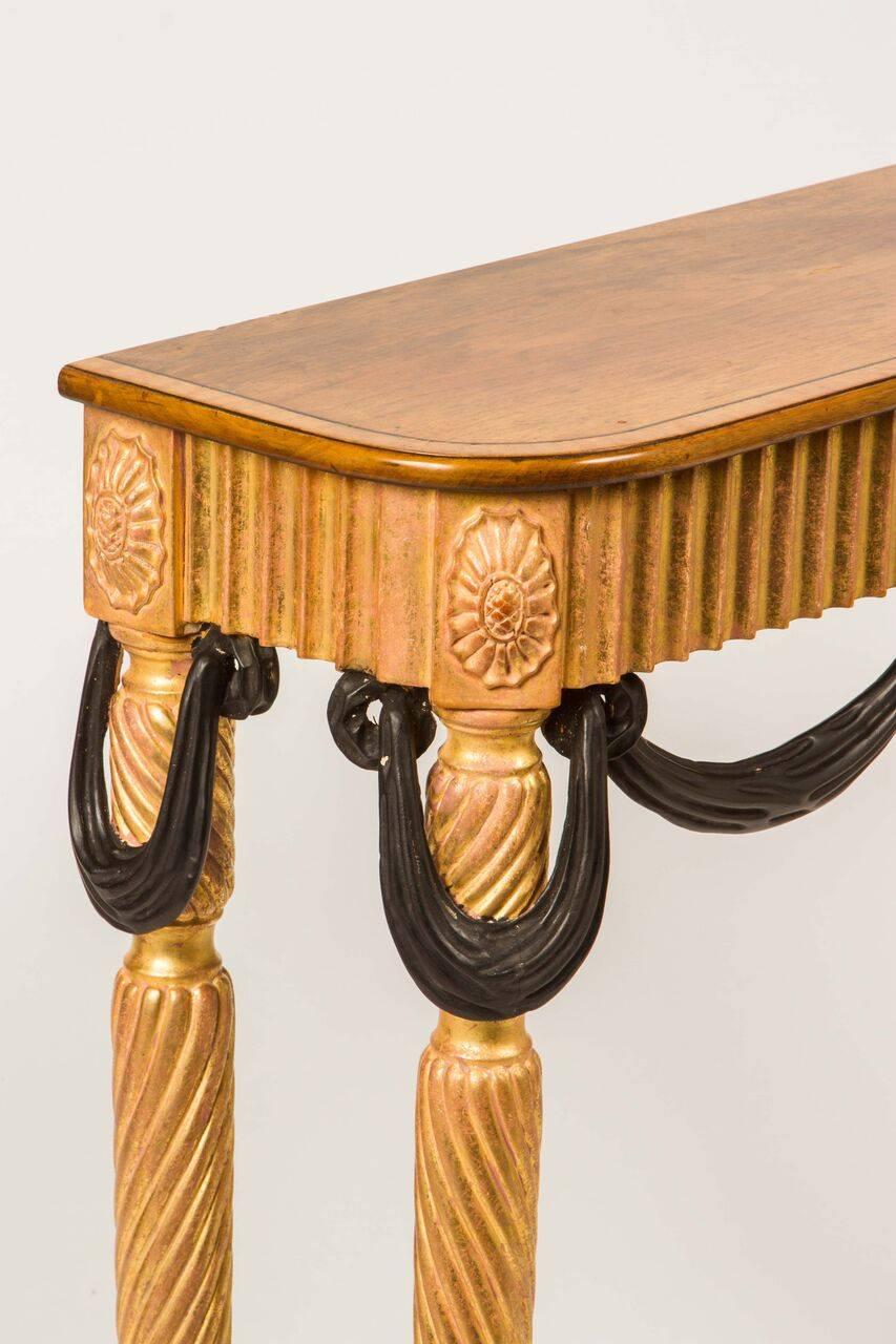 Wood Pair of Italian Neoclassical Style Giltwood and Ebonized Consoles