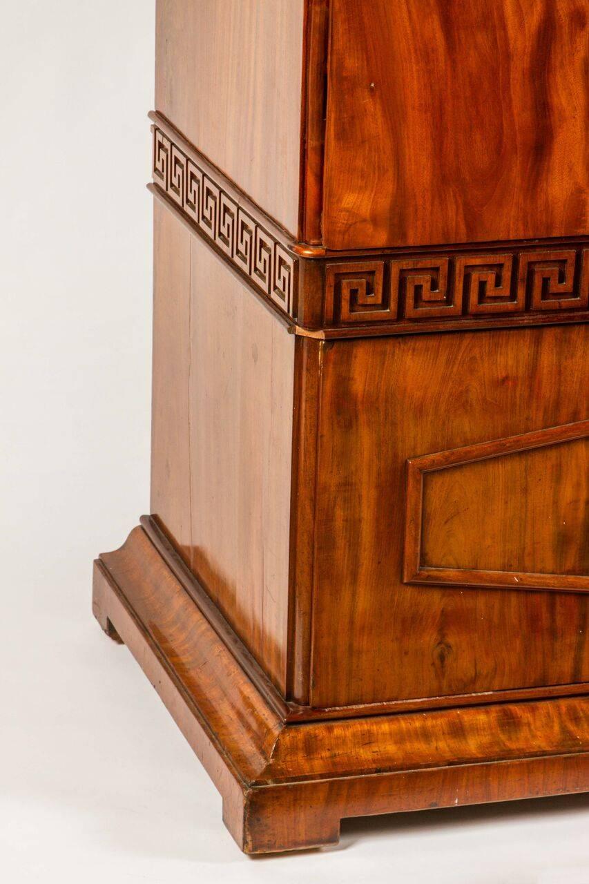 This stately Swedish neoclassical armoire in carved mahogany would make a wonderful wardrobe in a bedroom, or would be perfect for converting into an entertainment cabinet, 
circa 1820.