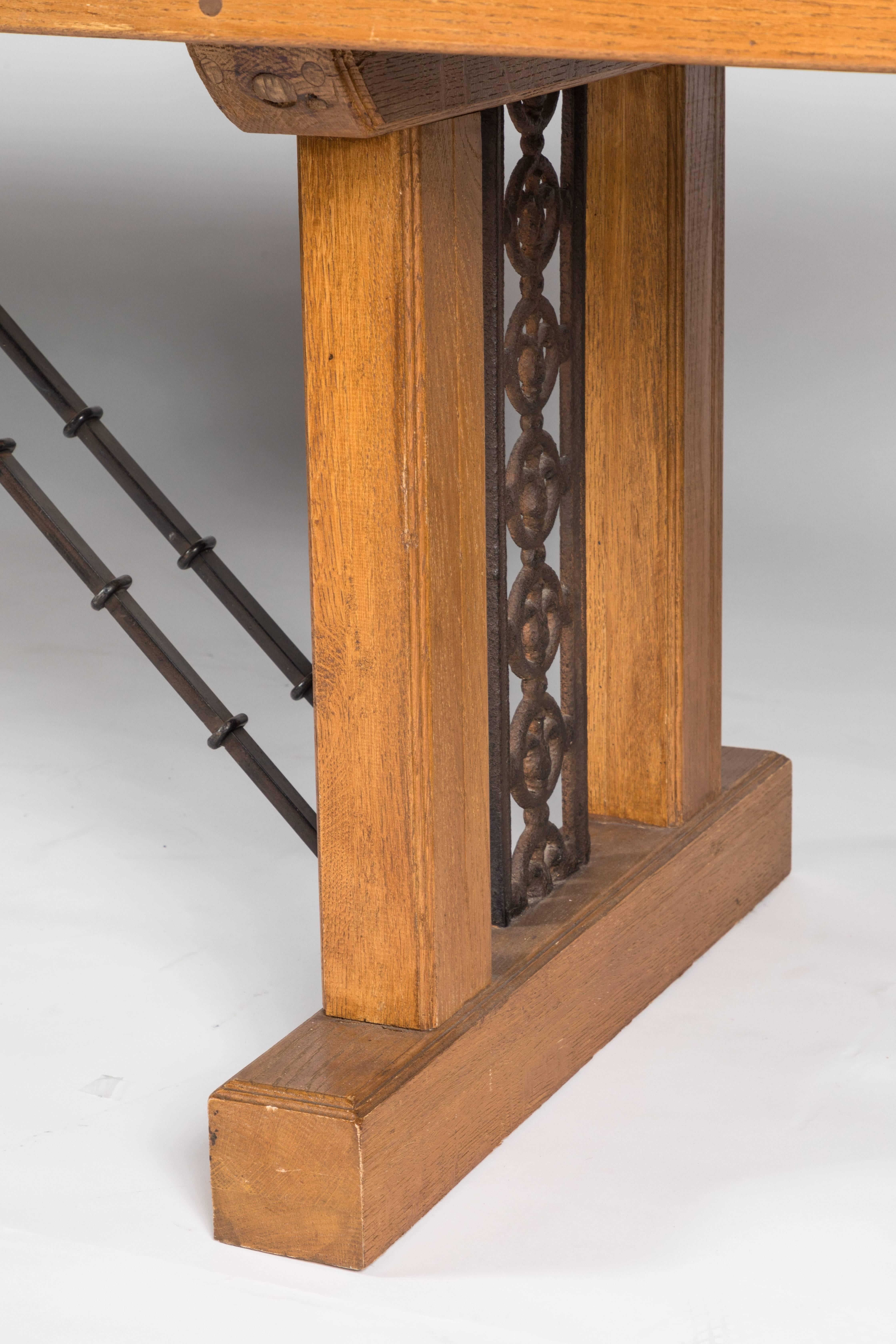 Clean lines and intricate ironwork give this dining table and old world feel with a modern twist. The hand-forged wrought iron is beautifully executed. Glass inset top allows it to be used in a more transitional space.
 