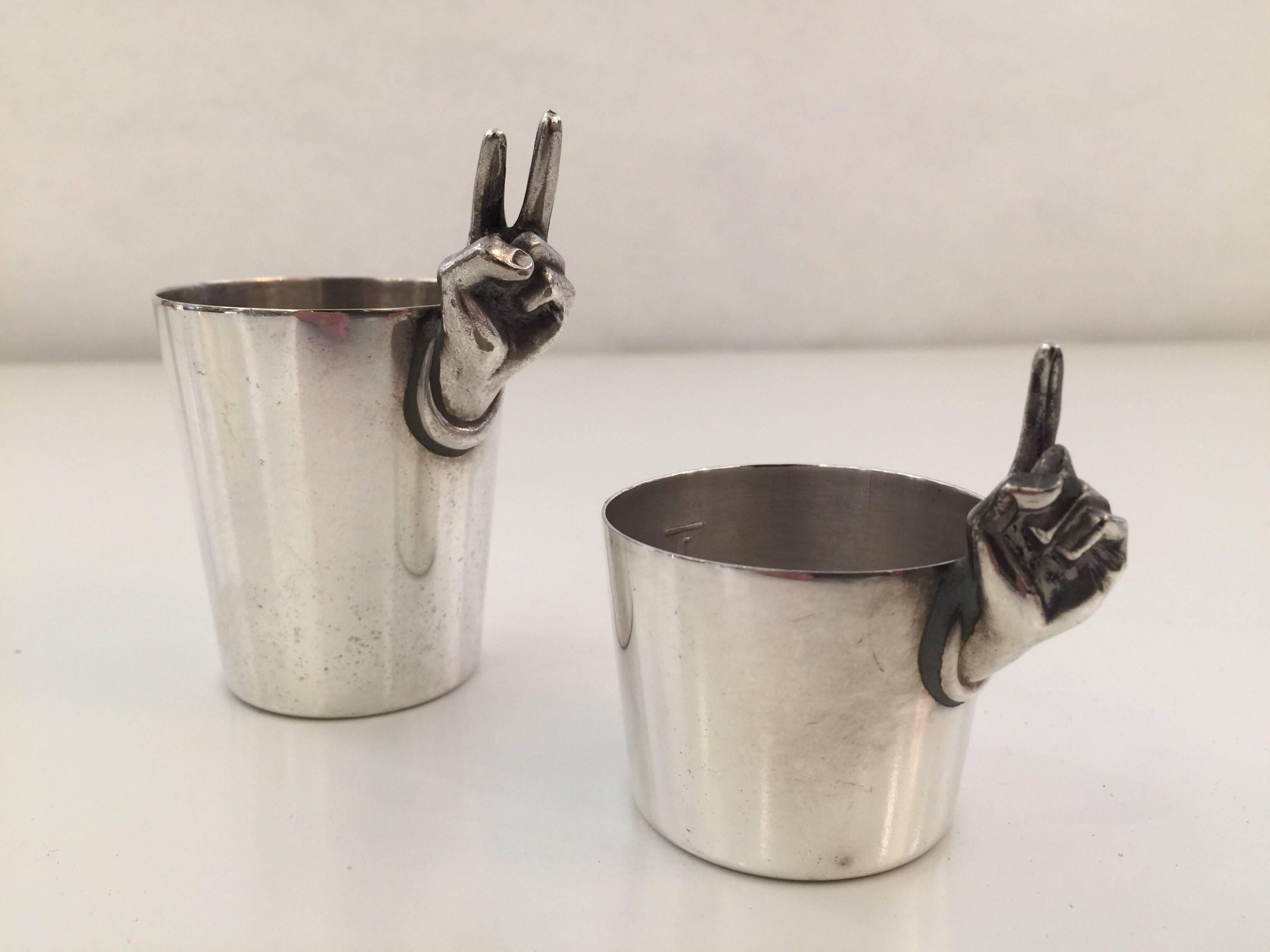 Silver plated vintage cocktail jiggers with whimsical and unique design of 