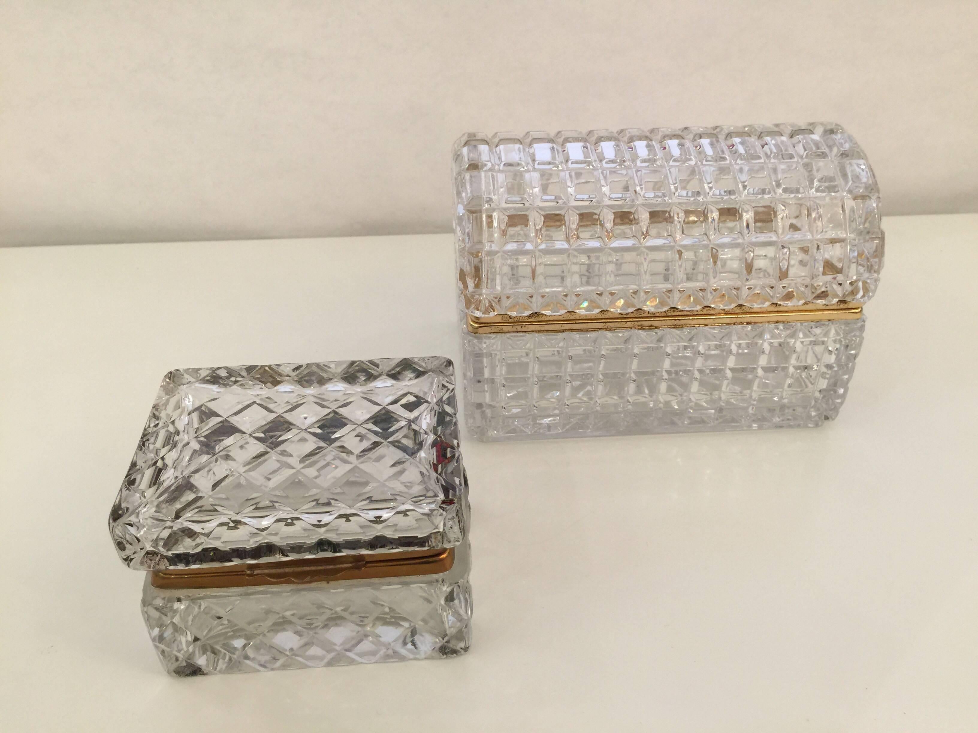 Trimmed with gilt metal hardware and patterned glass design throughout, these two boxes are a wonderful set (domed and square top).

Dimensions: Large box is 5.5 inches tall, 7.5 inches wide, 4.5 inches deep
Small box is 3.25 inches tall, 4.5
