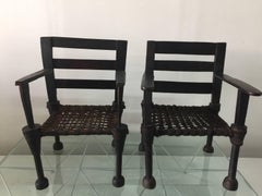 Pair of West African Ironwood and Leather Throne Chairs