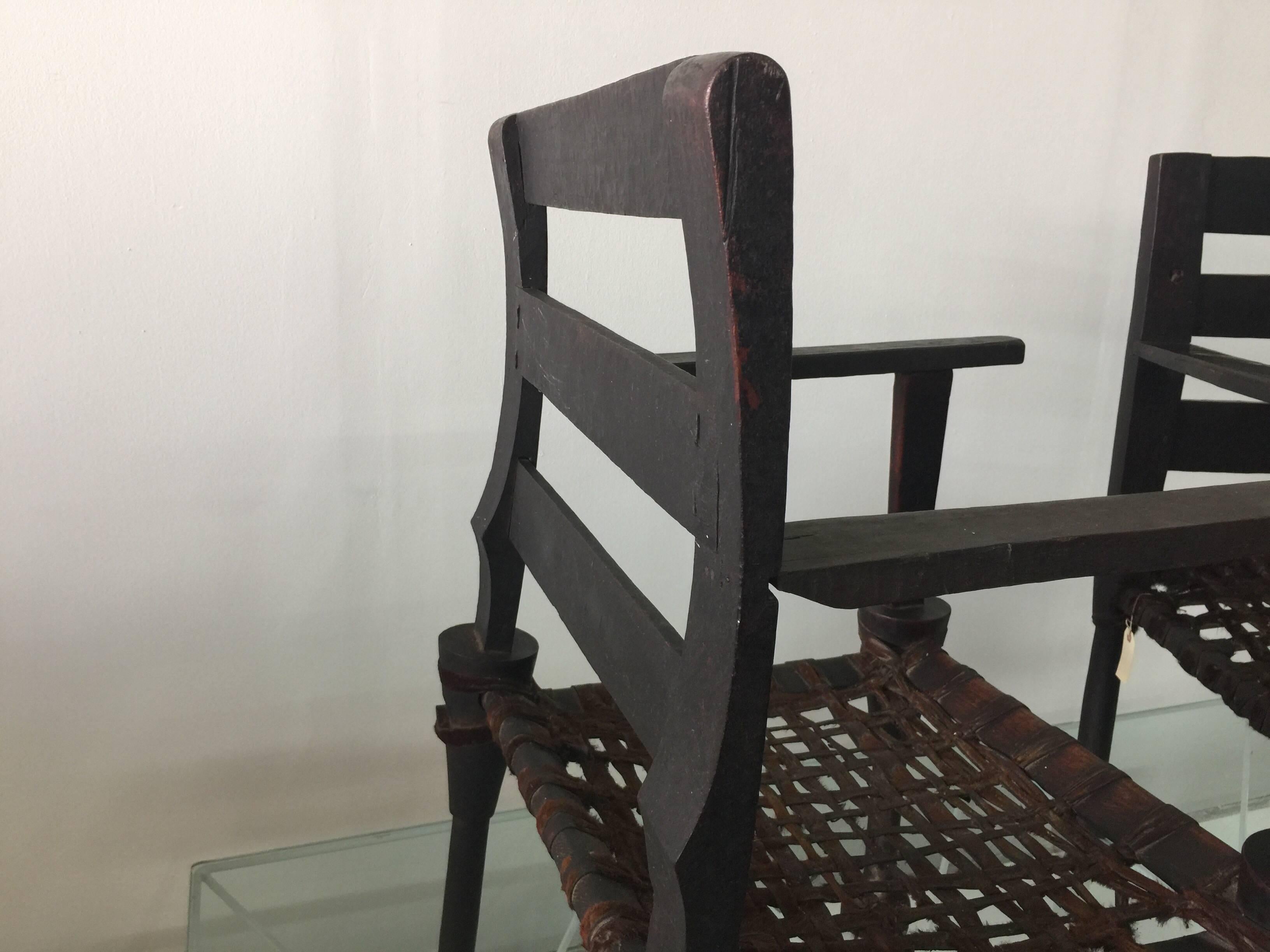 Pair of West African Ironwood and Leather Throne Chairs For Sale 1