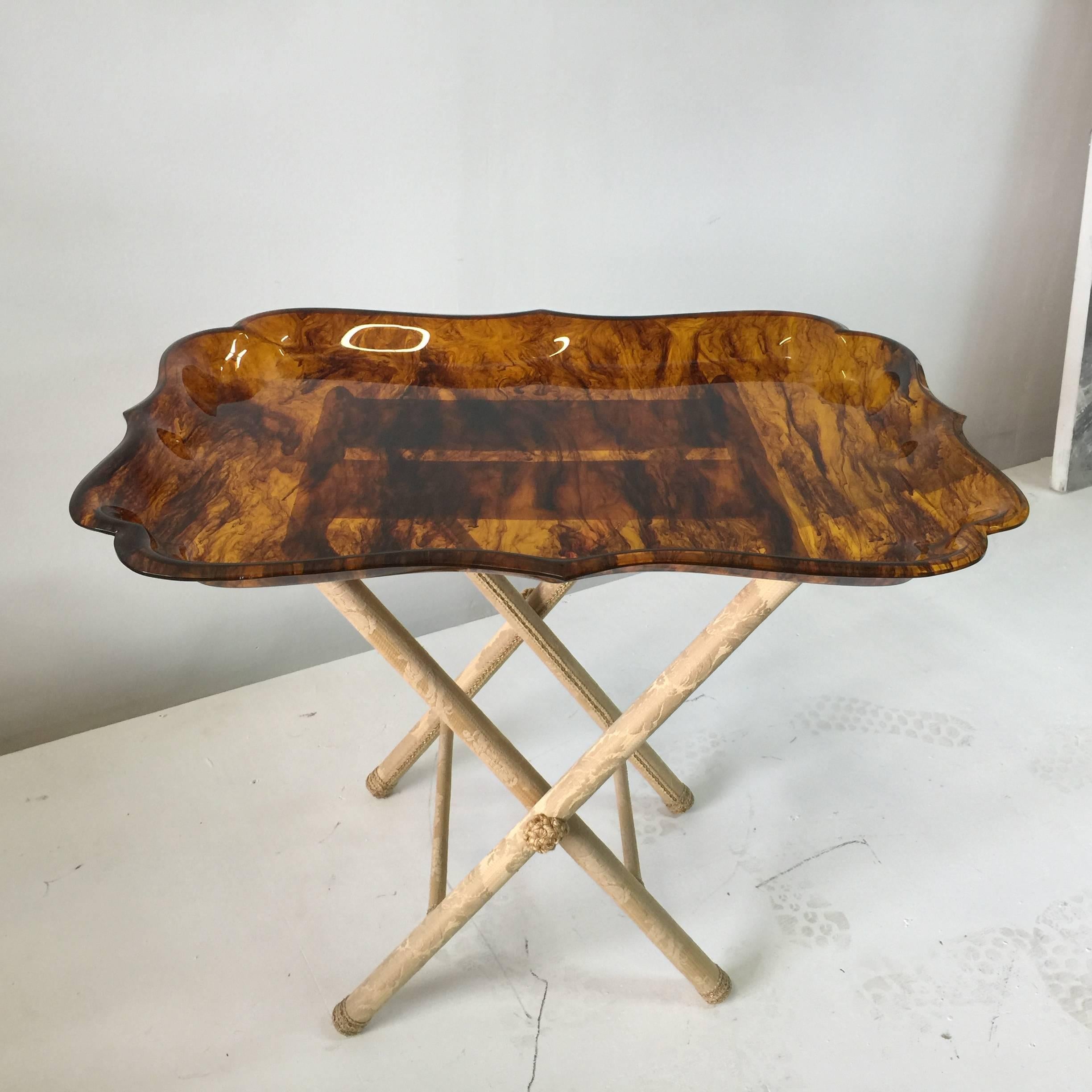 This very elegant yet whimsical tea service or side table is comprised of: An intricately designed scalloped acrylic tray with transparent tortoise shell finish, a completely covered folding stand in vintage Fortuny silk. Very stylish Venetian set!