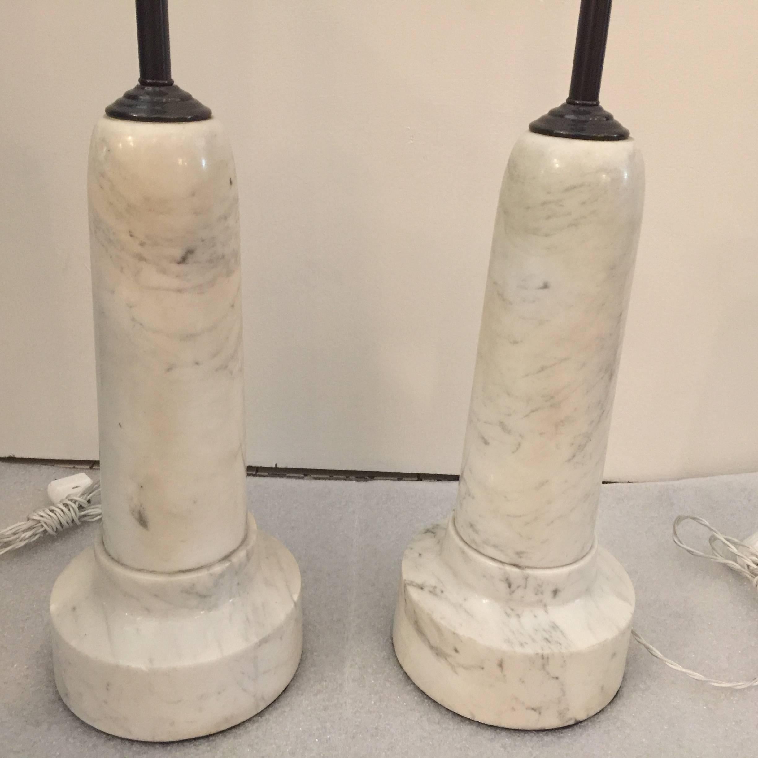 Heavy quality turned marble lamps. Rewired with silk cable and double socket cluster.