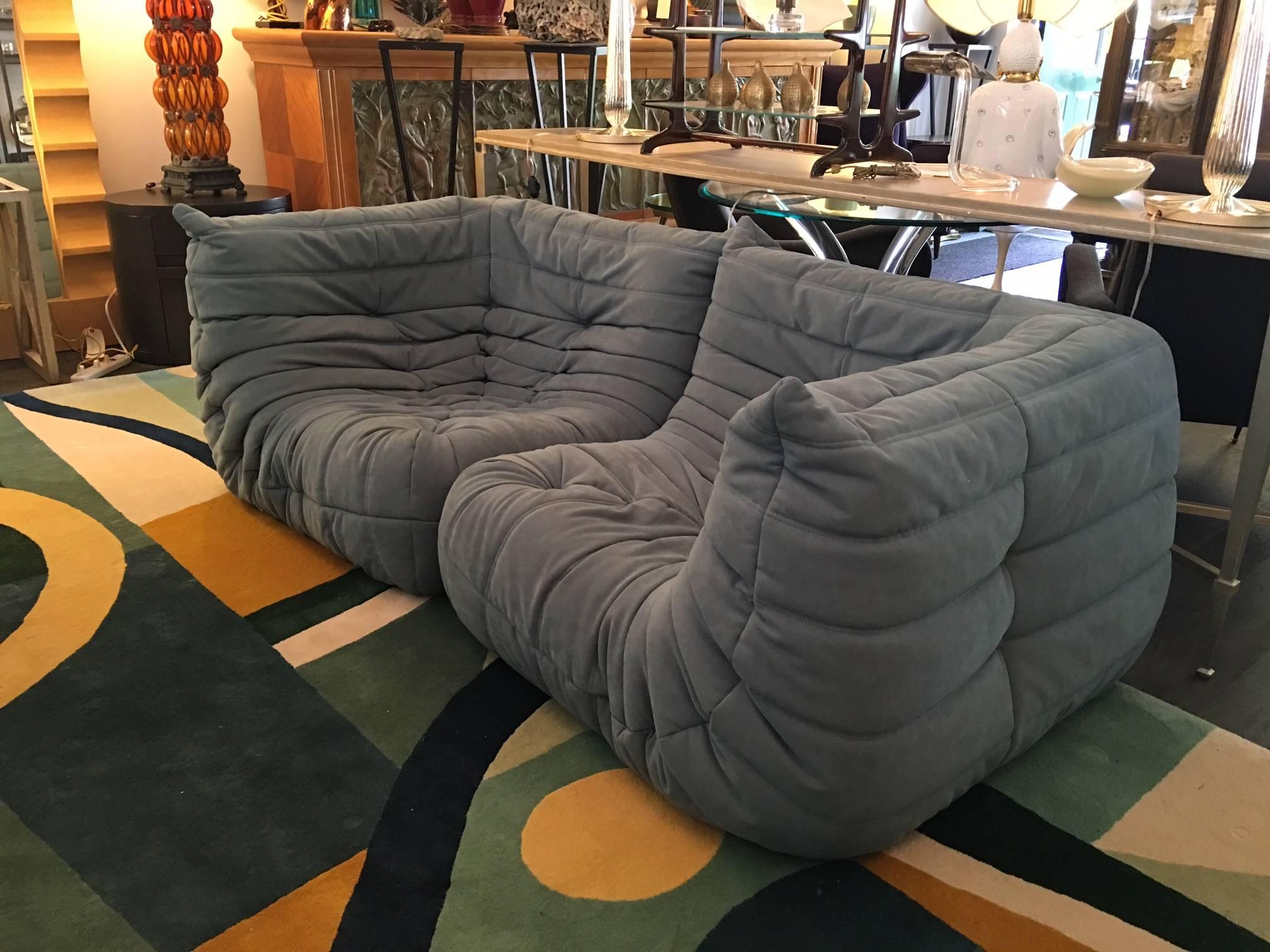 NOTE:  Although NOT pictured here, there are THREE sofas (triple seats) and TWO corner chairs.  This makes a LARGE U-shaped sectional.  These are a muted blue/green suede/leather (note: Some images appear with grey undertones - see additional