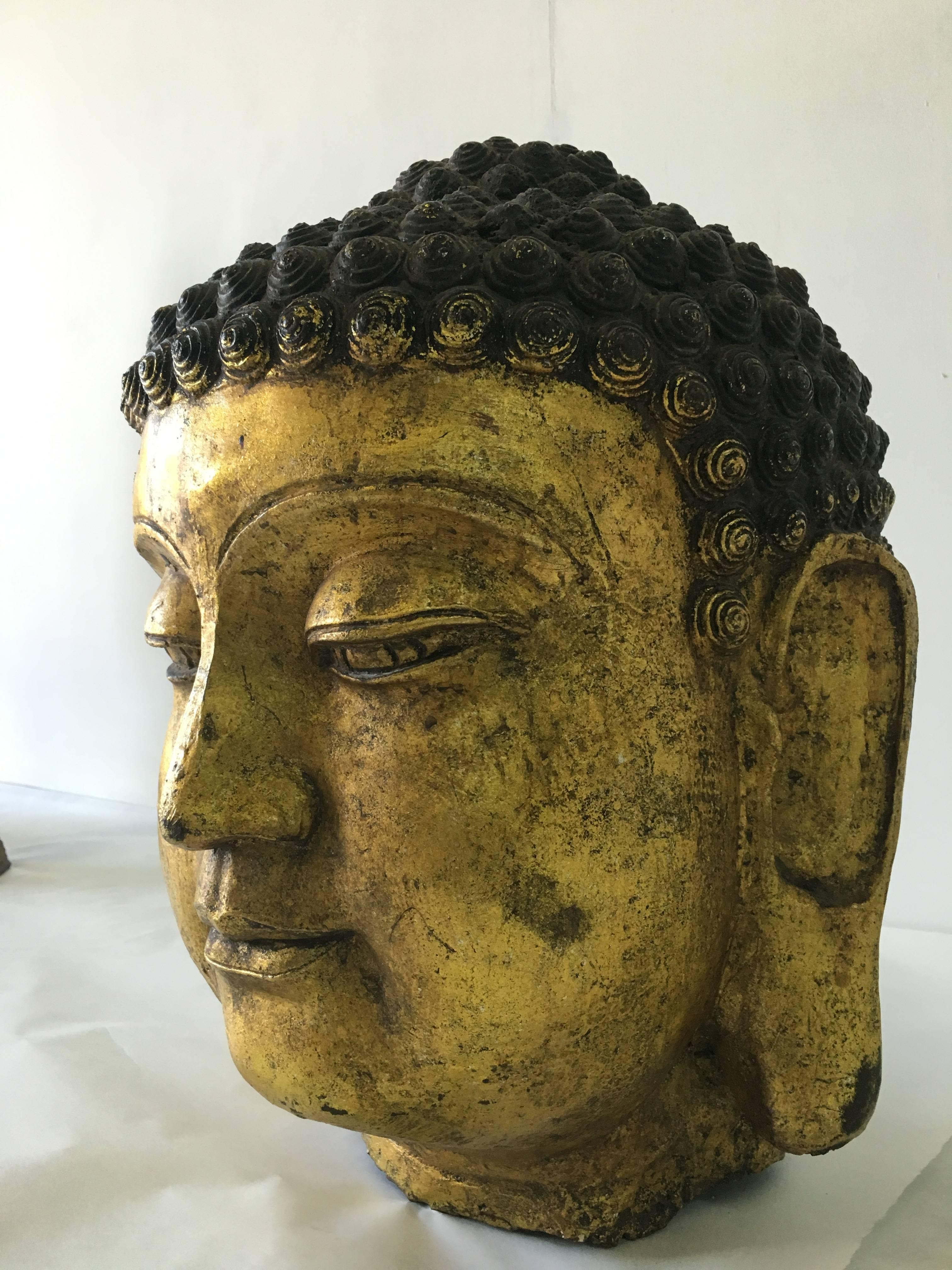 This is a very large and greatly detailed sculpture measuring 18 inches tall and 12 inches in diameter. All original and in perfect preserved antique condition. This peaceful image of Buddha from Laos/Thailand region adds simple elegance to any