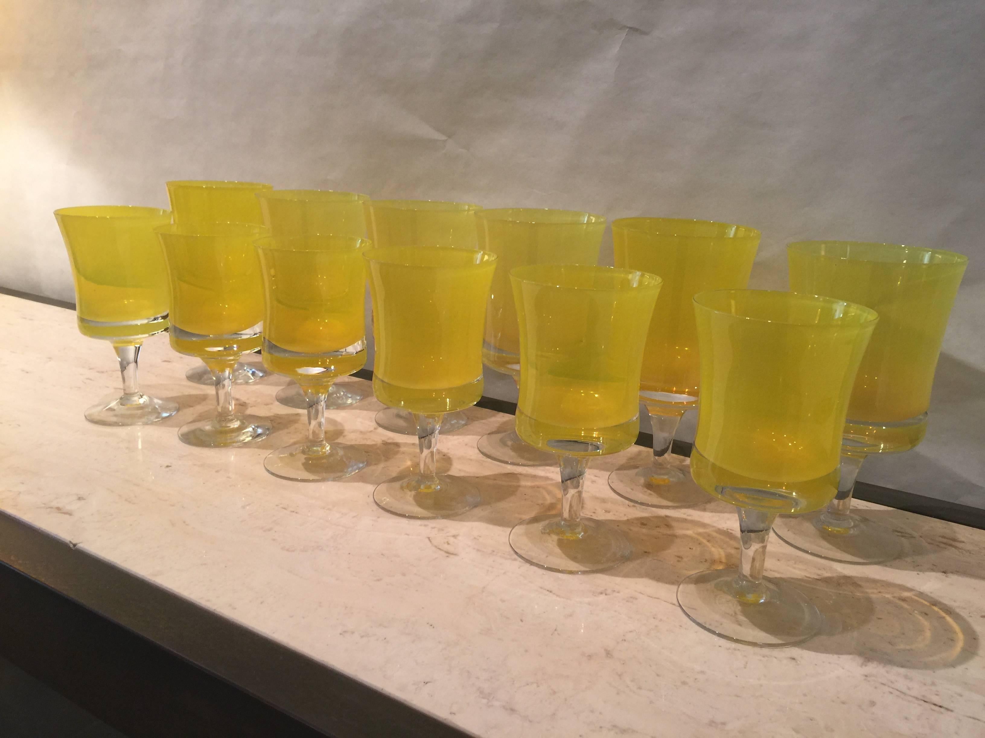 Festive and happy vintage yellow glassware by Seguso, six larger water glasses and six smaller wine glasses. Additional yellow bowl as shown in detail images is available separately.

Dimensions: Large glass 6.5 inches tall, small glass 5.75