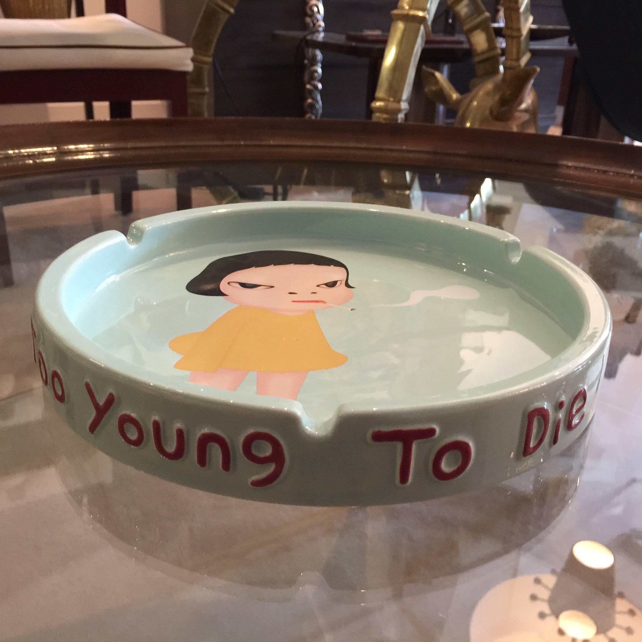 The image is from a painting entitled 'Too Young To Die' which was included in an exhibition called 'I Don't Mind, If You Forget Me' at the Yokohama Museum of Art in September 2001. At 10 inches in diameter, this ashtray can double as a dish! The