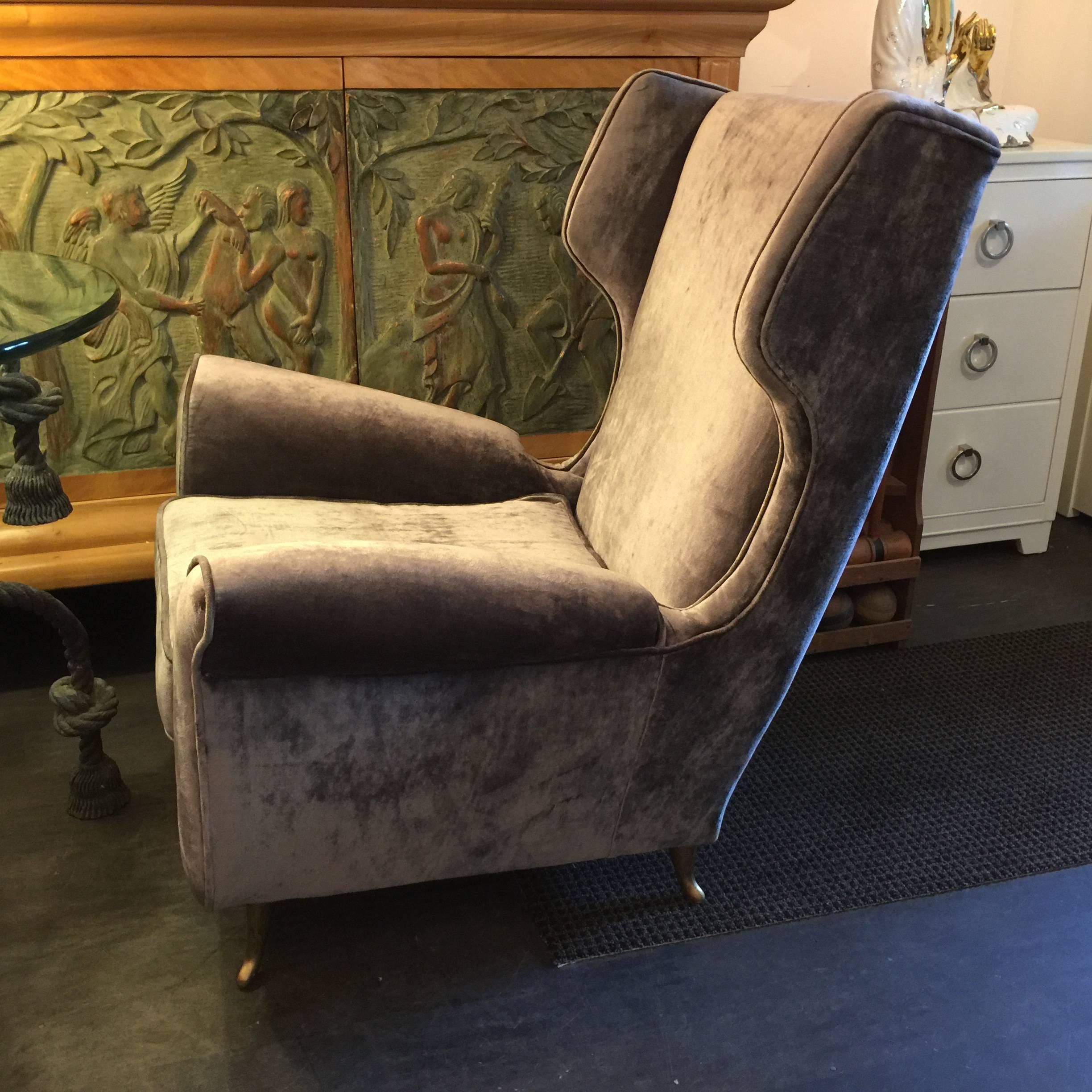 Great feet and luxurious fabric with great style Italian armchairs.